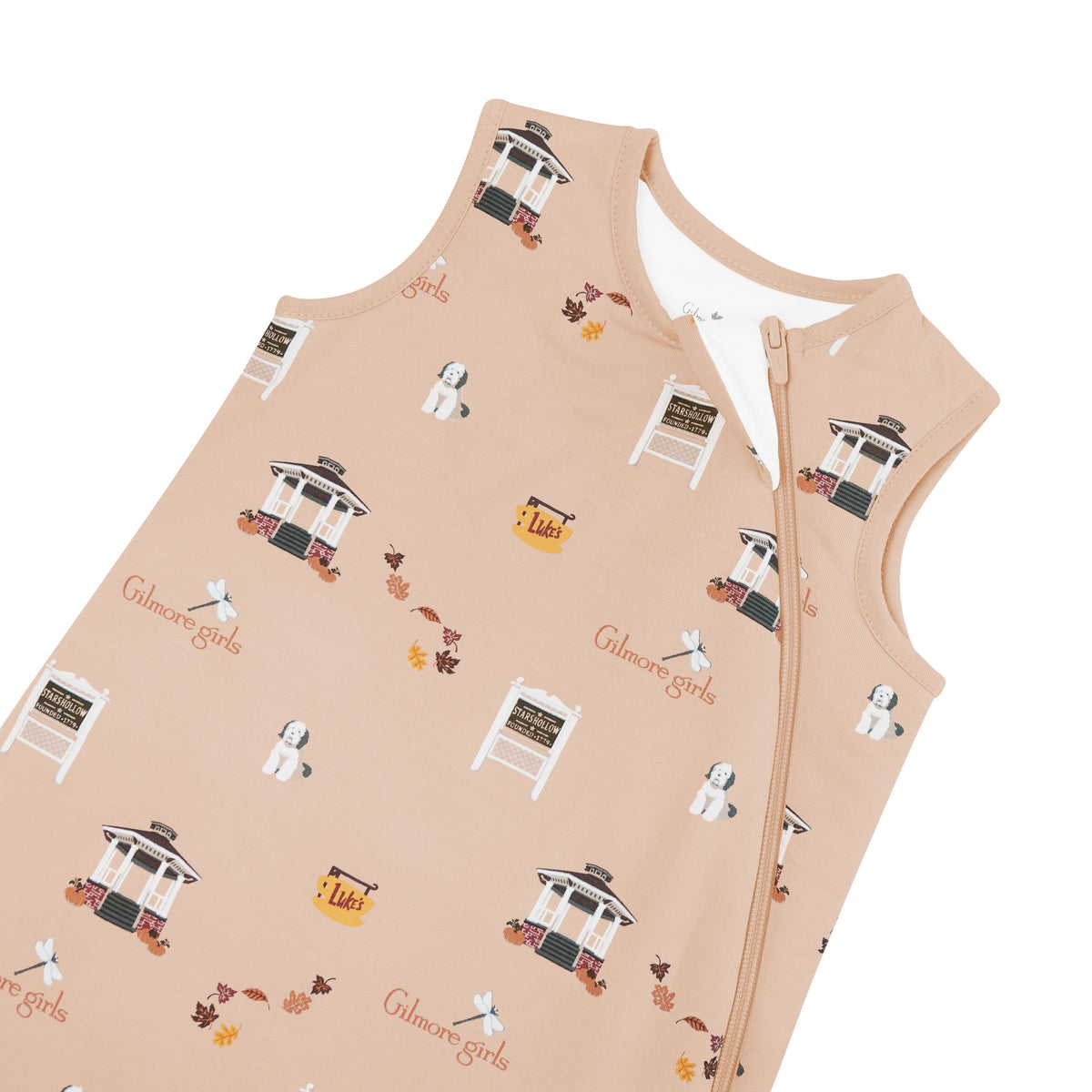 Beige baby sleep bag with Gilmore Girls pattern on a white background
