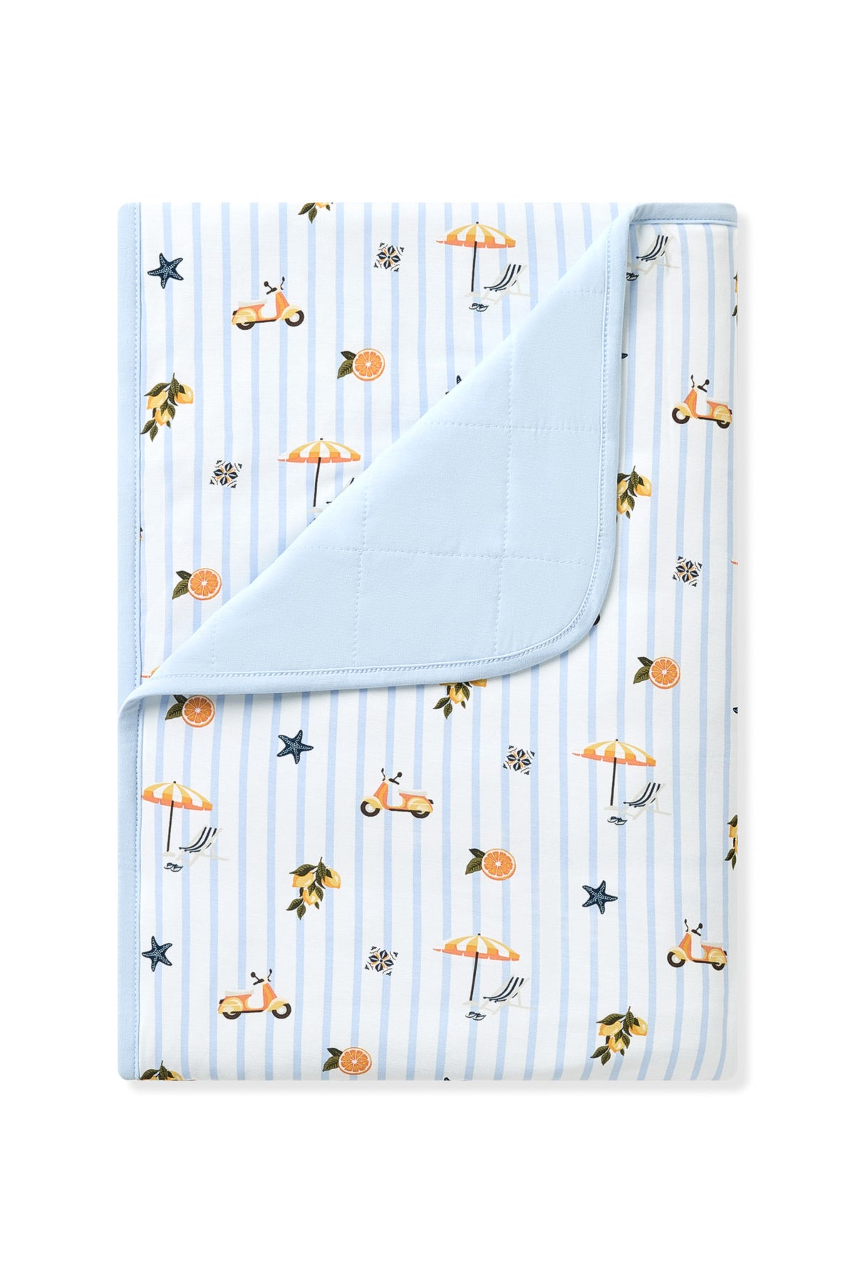 Toddler Blanket in Amalfi Coast 1.0 with the corner flipped down showing the quilted light blue backing