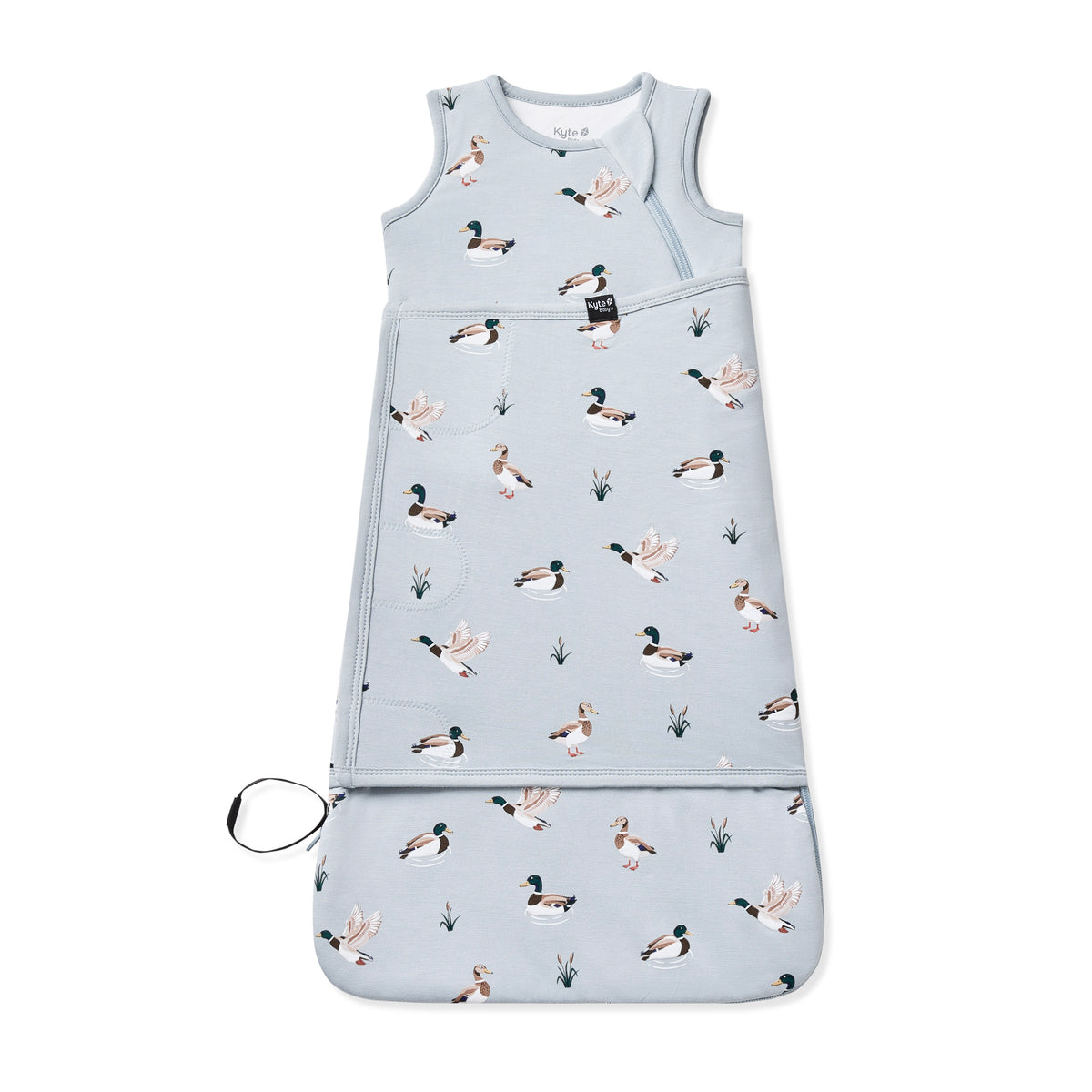 Sleep Bag Swaddler in Mallard Duck 1.0 shown swaddled on a white surface