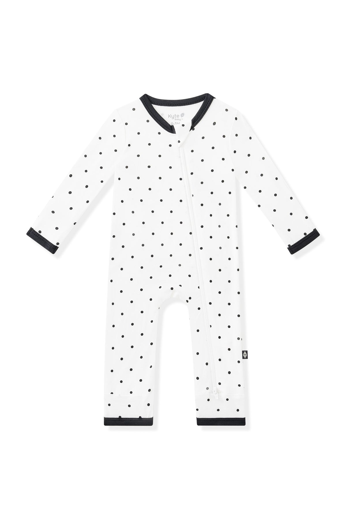 Zippered Romper in Midnight Polka Dot with black trim on white background