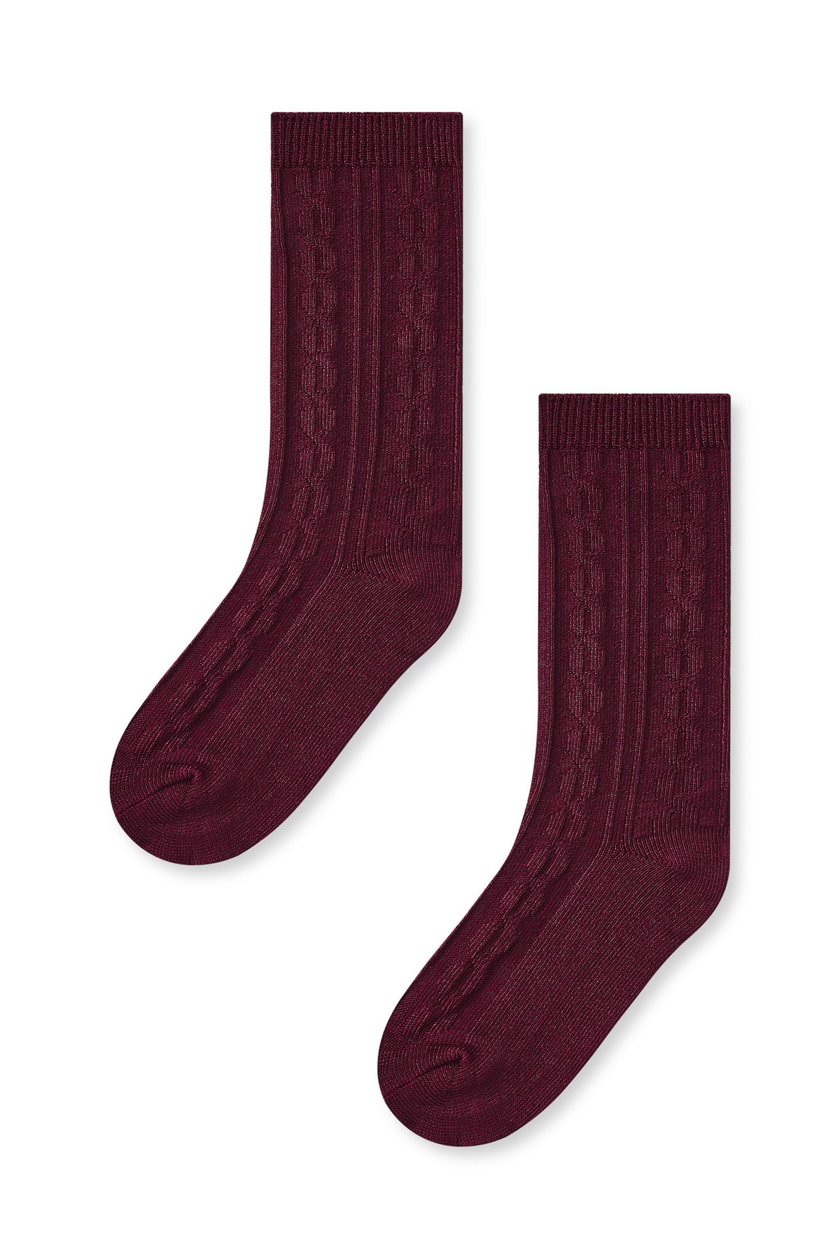 Knee high socks in burgundy laying flat on a white background.