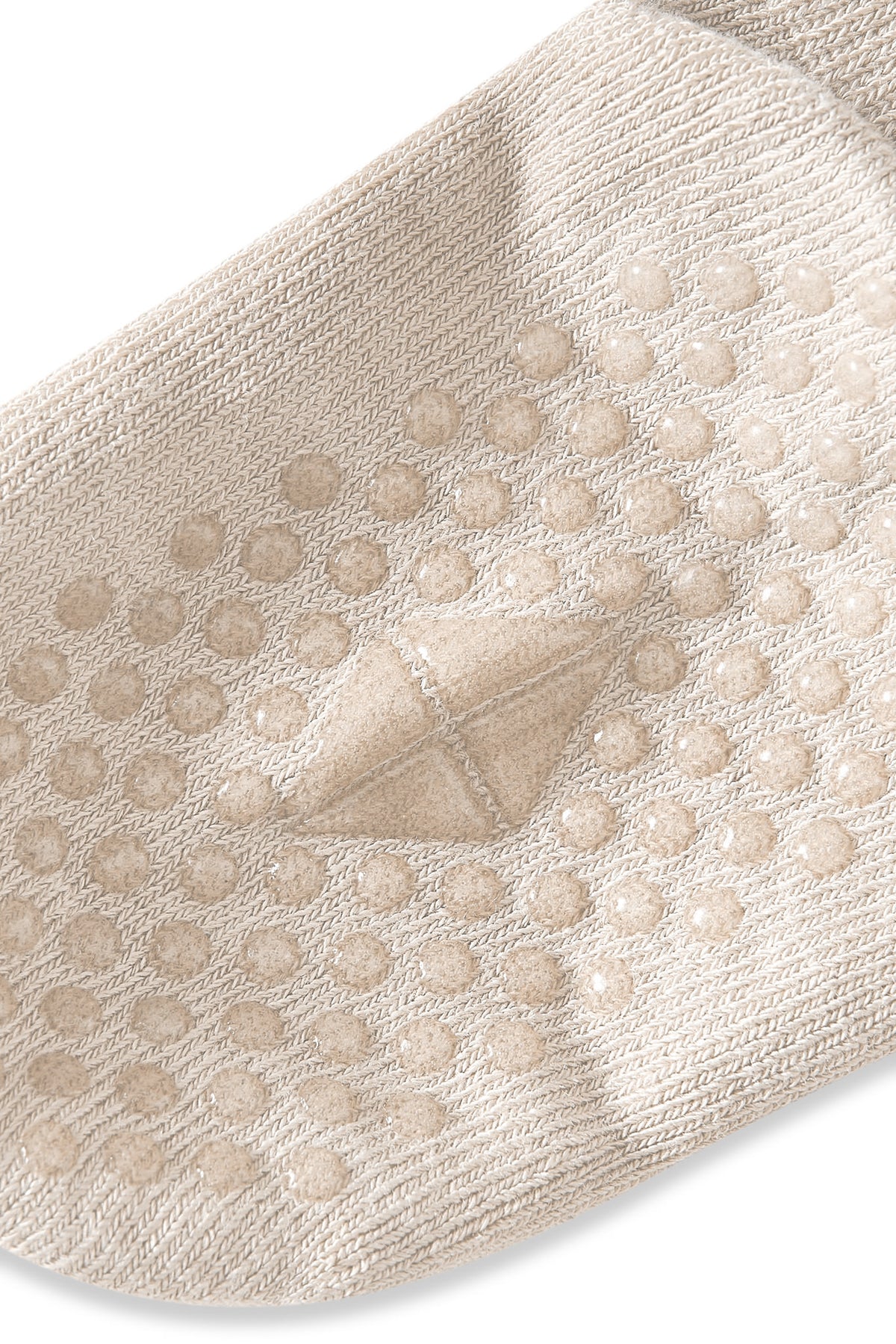 Bottom of Kyte sock with grips.