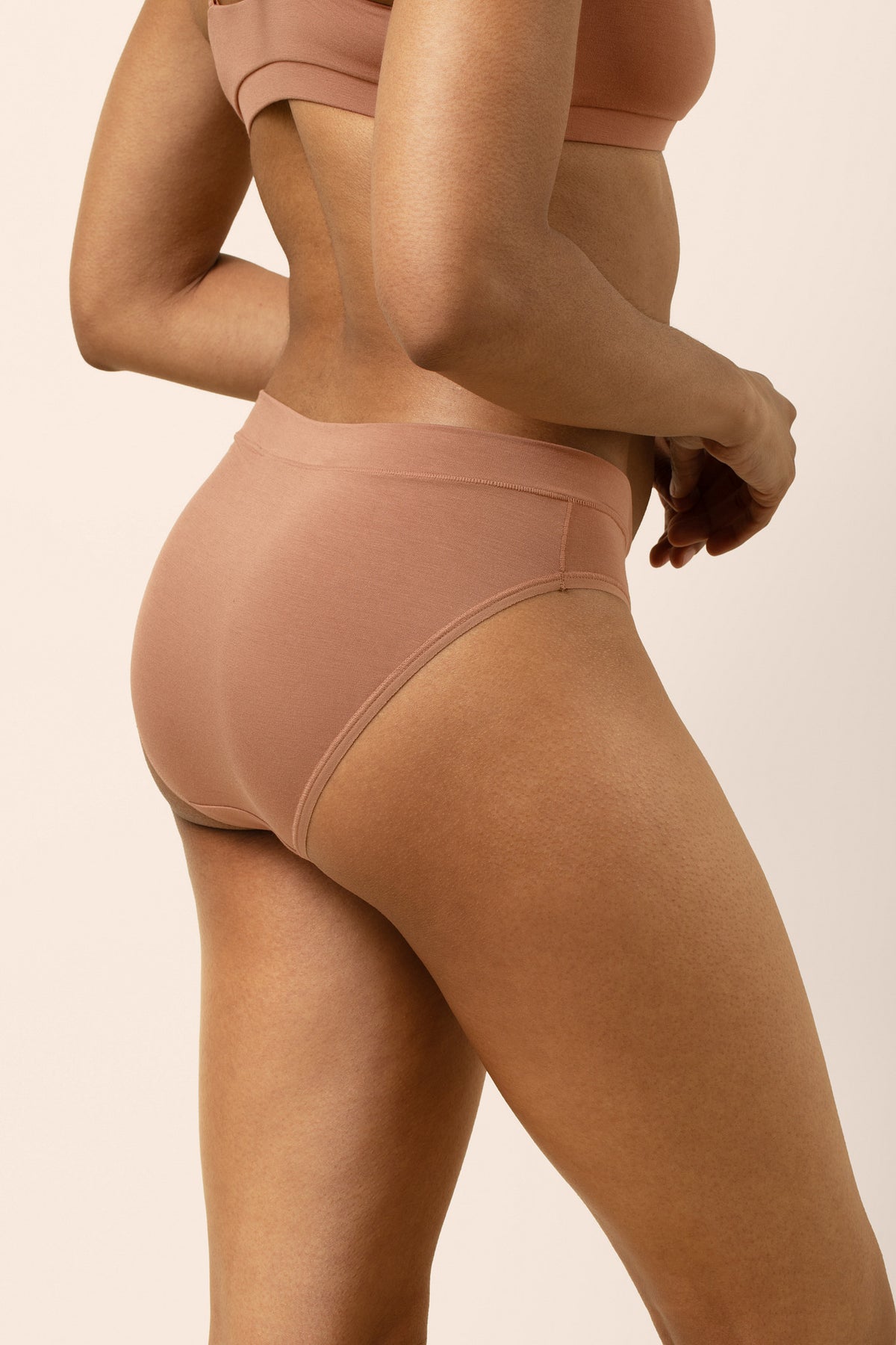 Female modeling the Women's Midi Brief in Latte