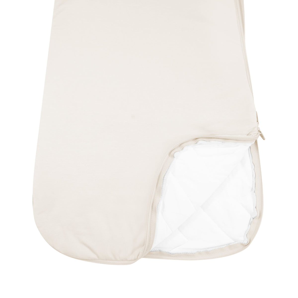 Close up of unzipped dual zipper Kyte Baby Sleep Bag in Oat 2.5