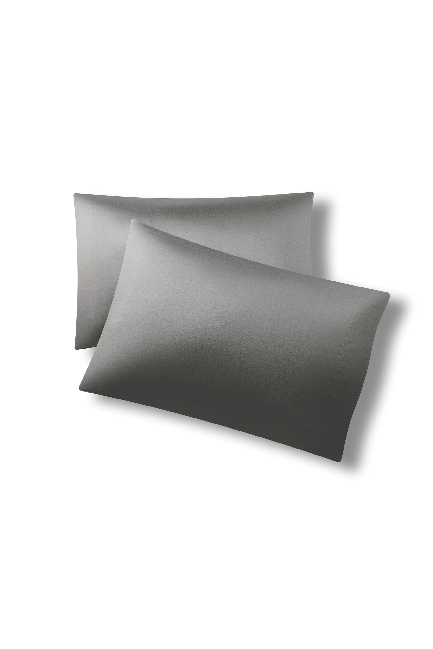 Two pillows one on top of the other with the Bamboo Sateen Pillowcases in Ash on them