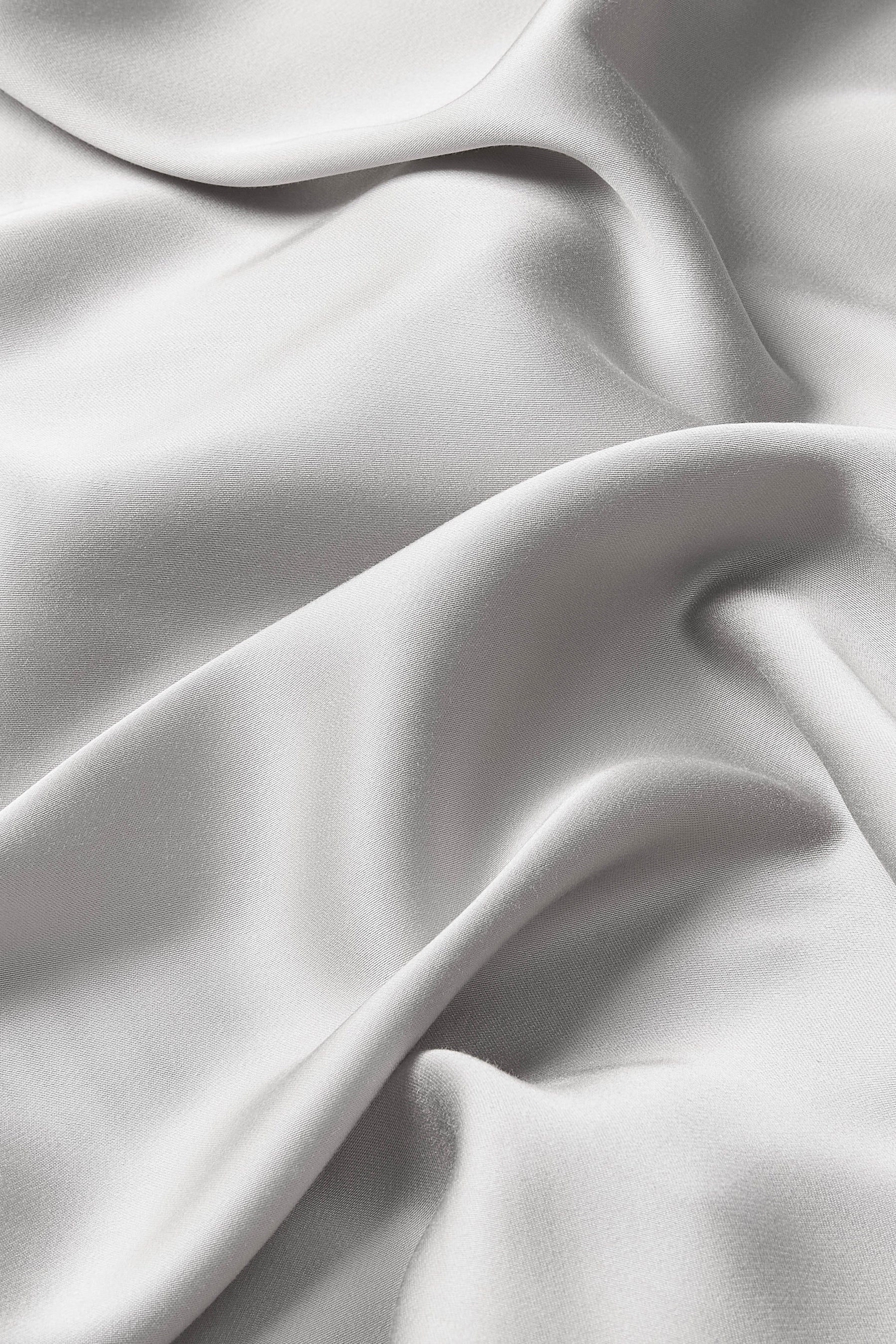 Close up of the bamboo sateen fabric: A warm grey