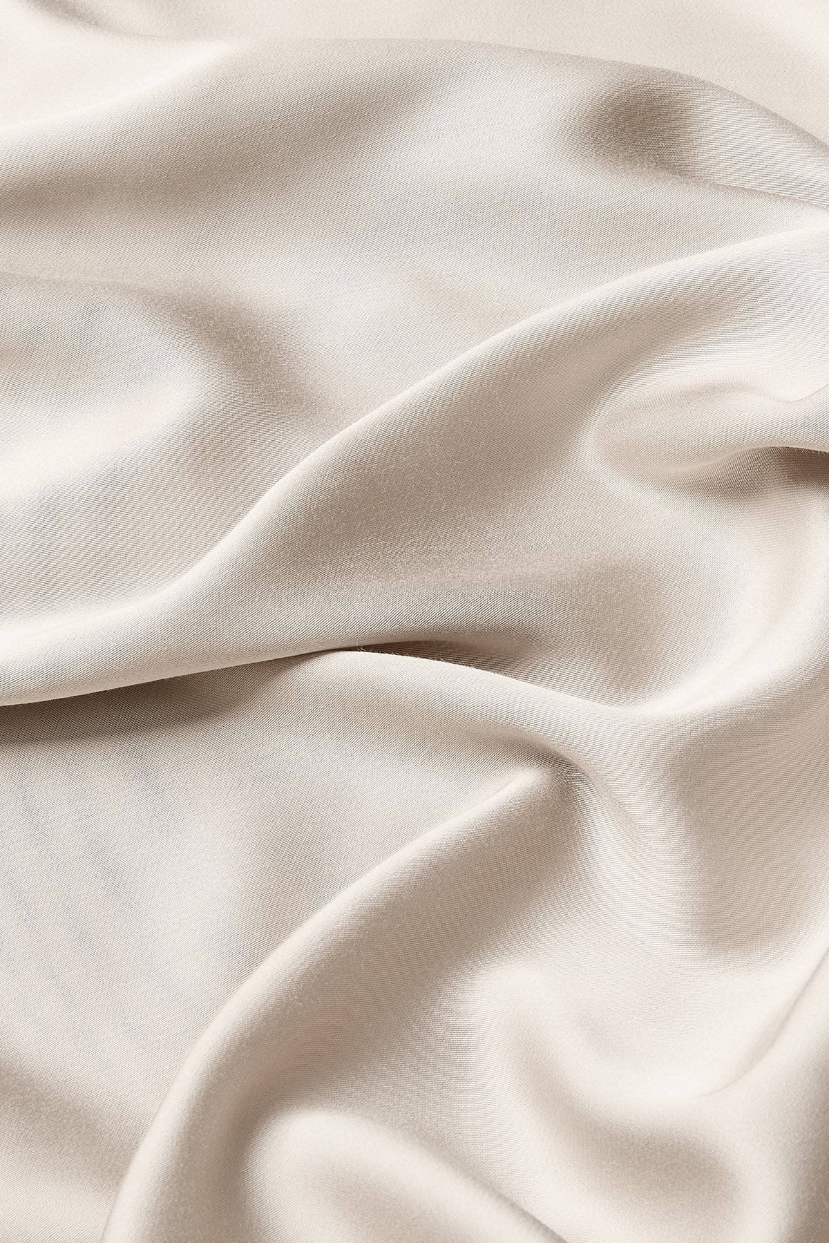 Close up of the bamboo sateen fabric: A dark beige