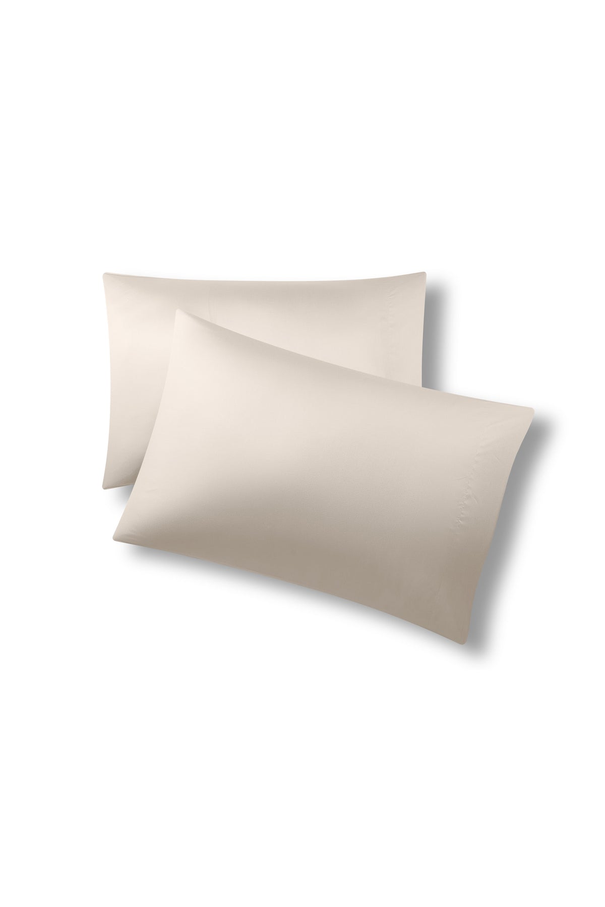 Two pillows one on top of the other with the Bamboo Sateen Pillowcases in Sand Stone on them