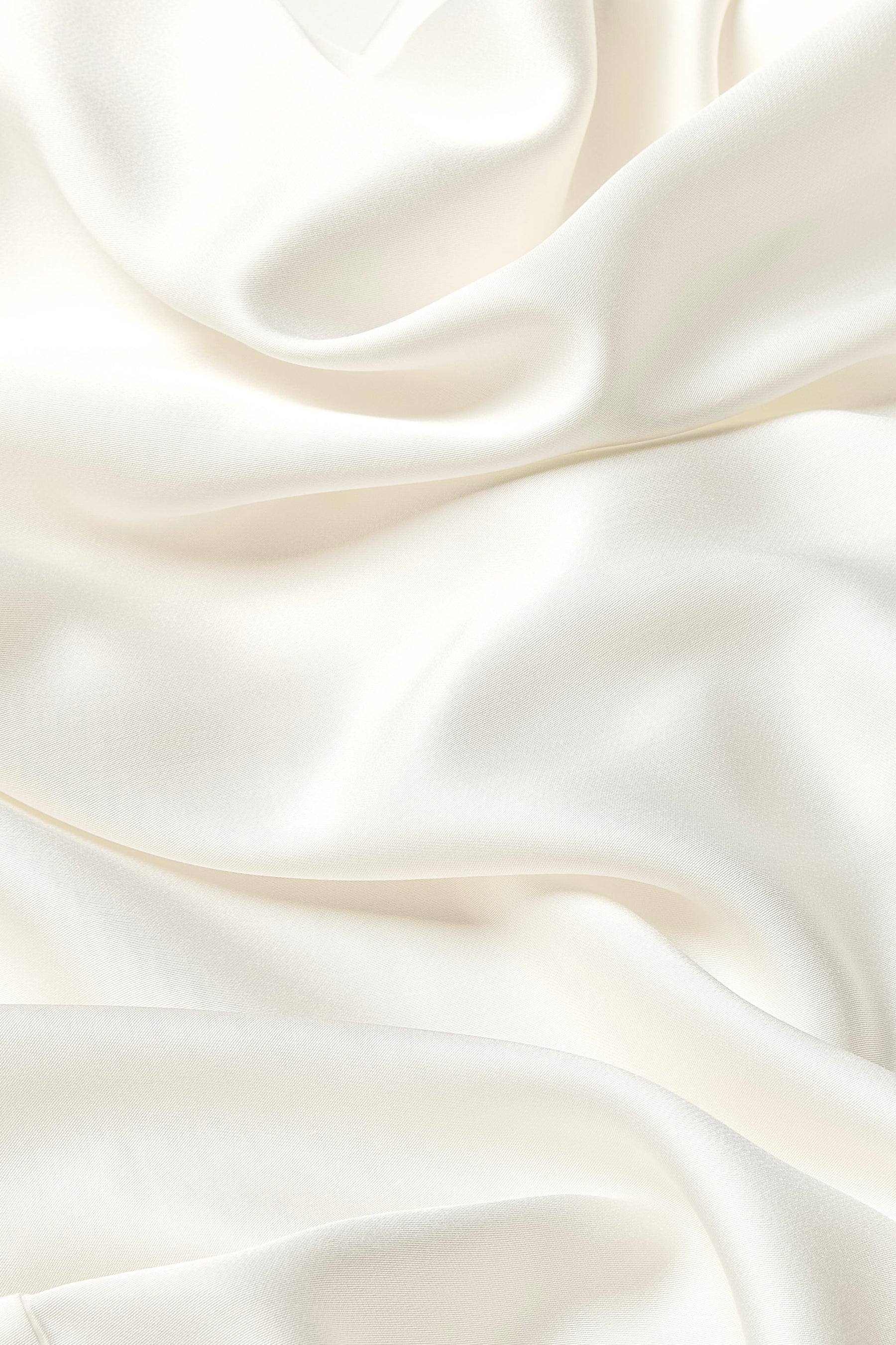 Close up of the bamboo sateen fabric: A soft off-white
