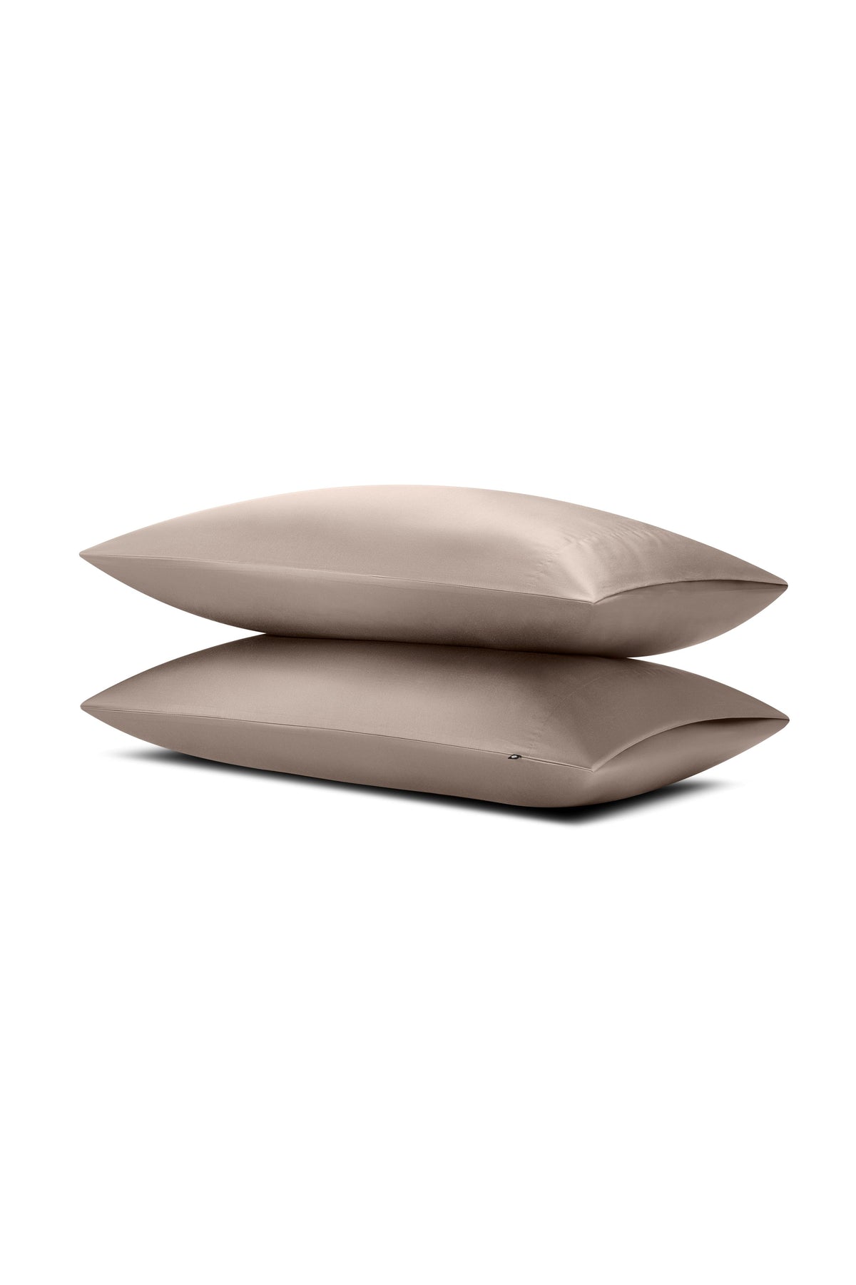 Two pillows stacked on top of the other with the Bamboo Sateen Pillowcases in Truffle on them