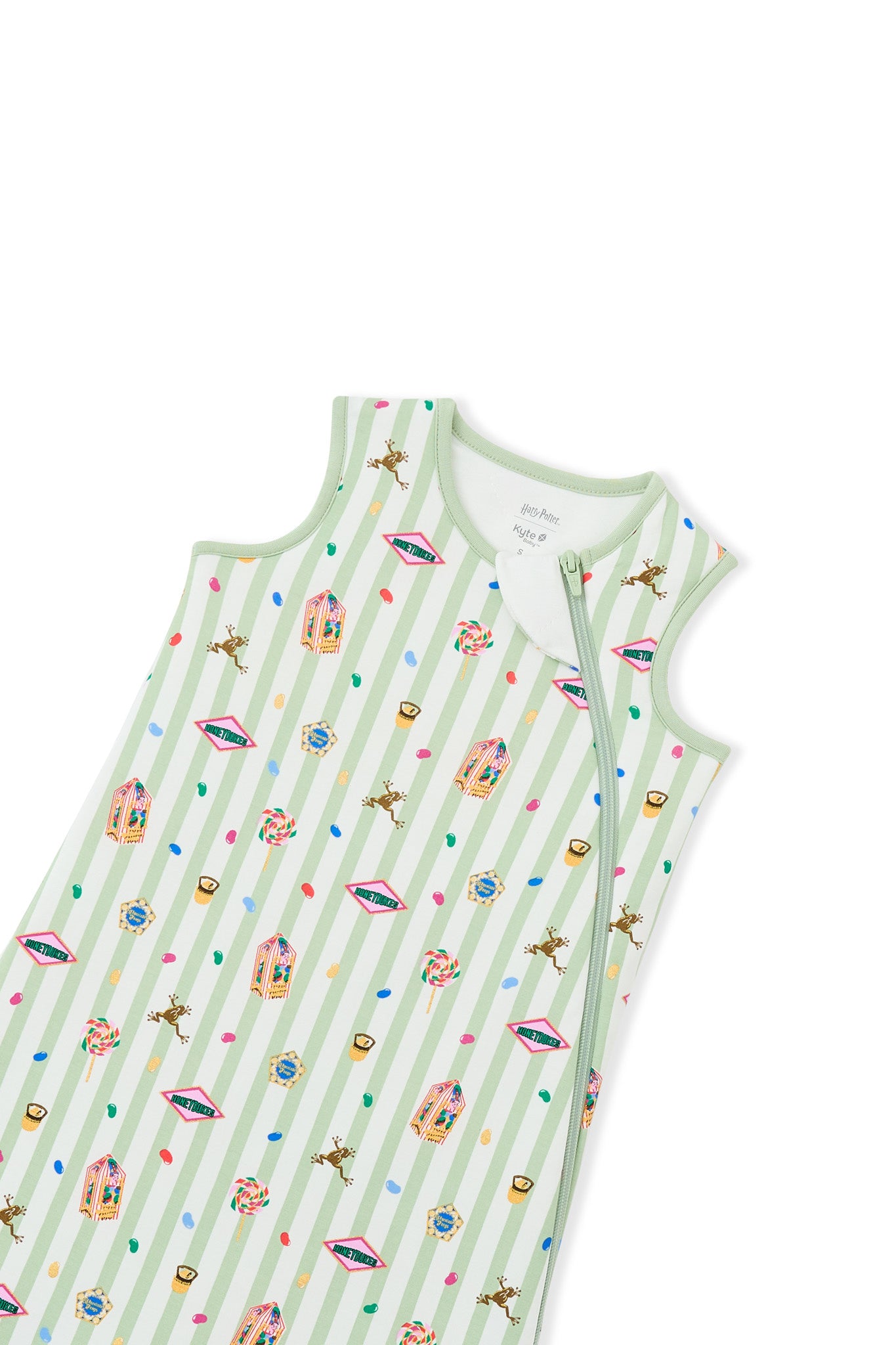 Zipper of green and white striped sleep bag with colorful Harry Potter patterns on a white background