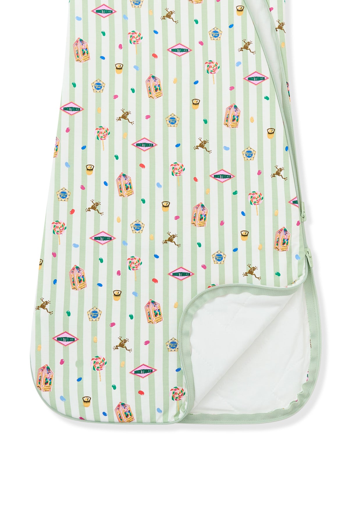 Bottom part of the sleep bag with colorful Harry Potter patterns on green and white striped fabric a white background