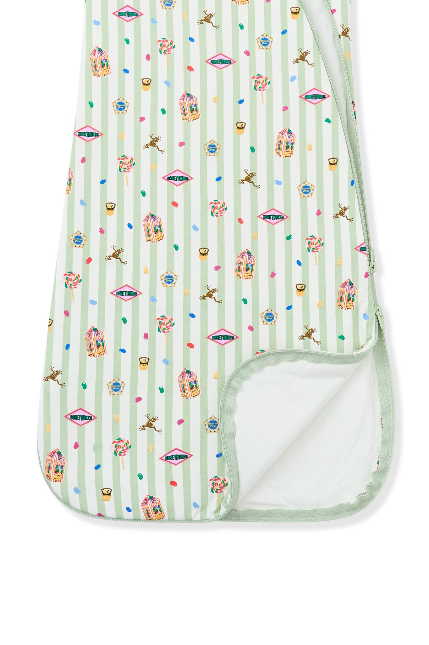 Bottom part of the sleep bag with colorful Harry Potter patterns on green and white striped fabric a white background