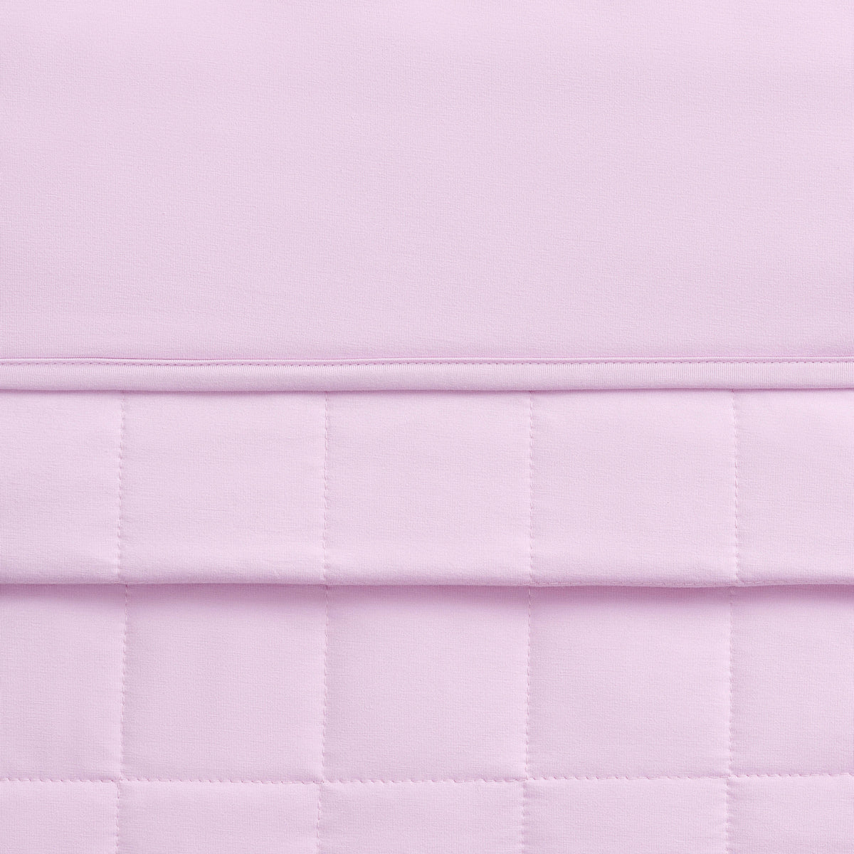 Close-up of a quilted purple blanket