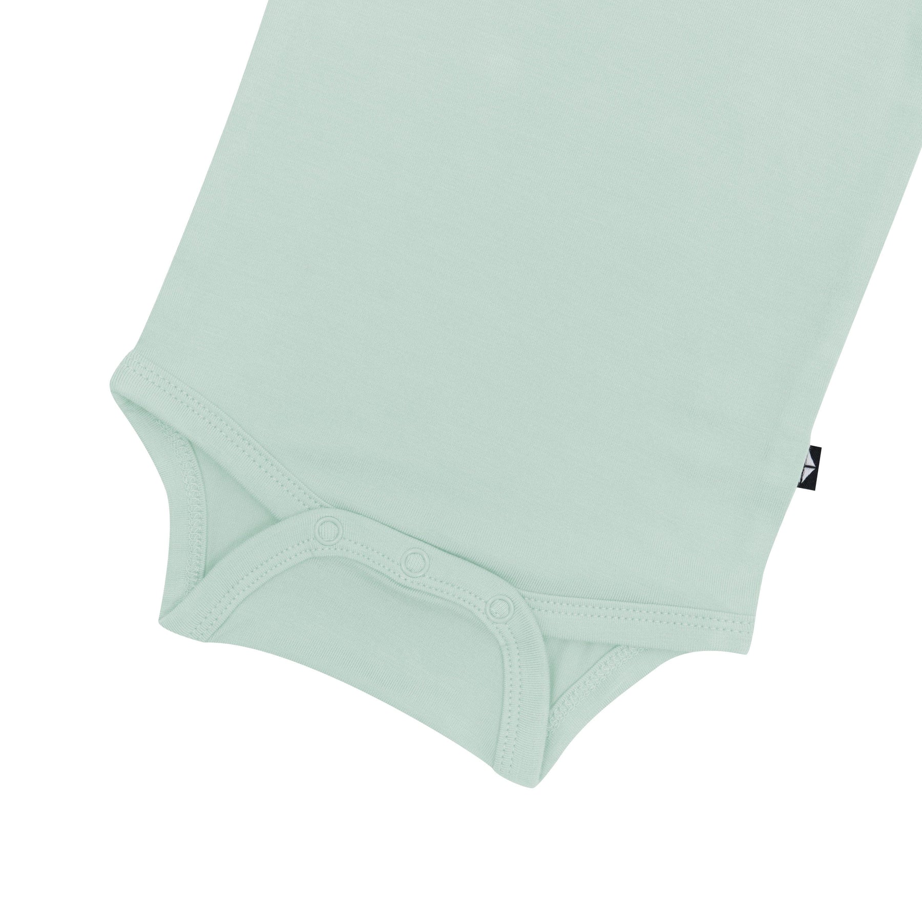 Close up of the snaps on the Kyte Baby Bodysuit in Sage