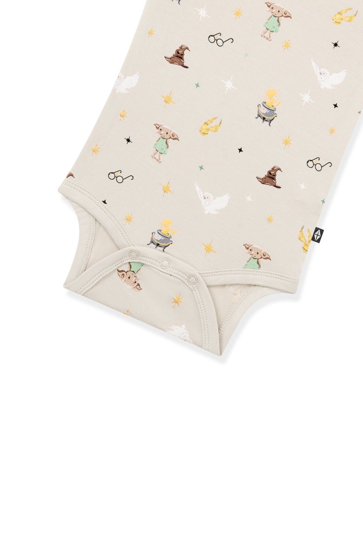 Bottom part of beige bodysuit with Harry Potter prints on a white background