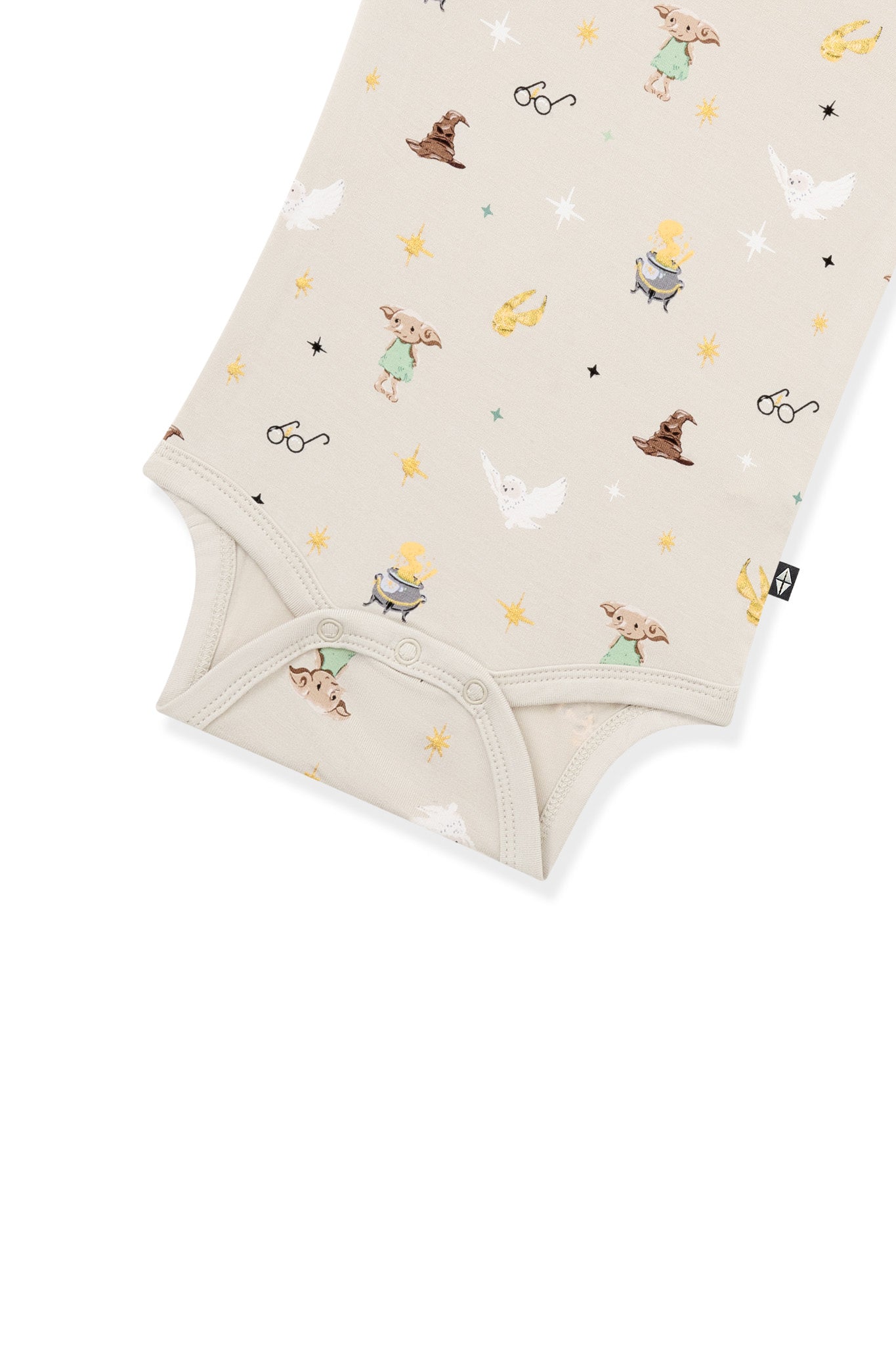Bottom part of beige bodysuit with Harry Potter prints on a white background