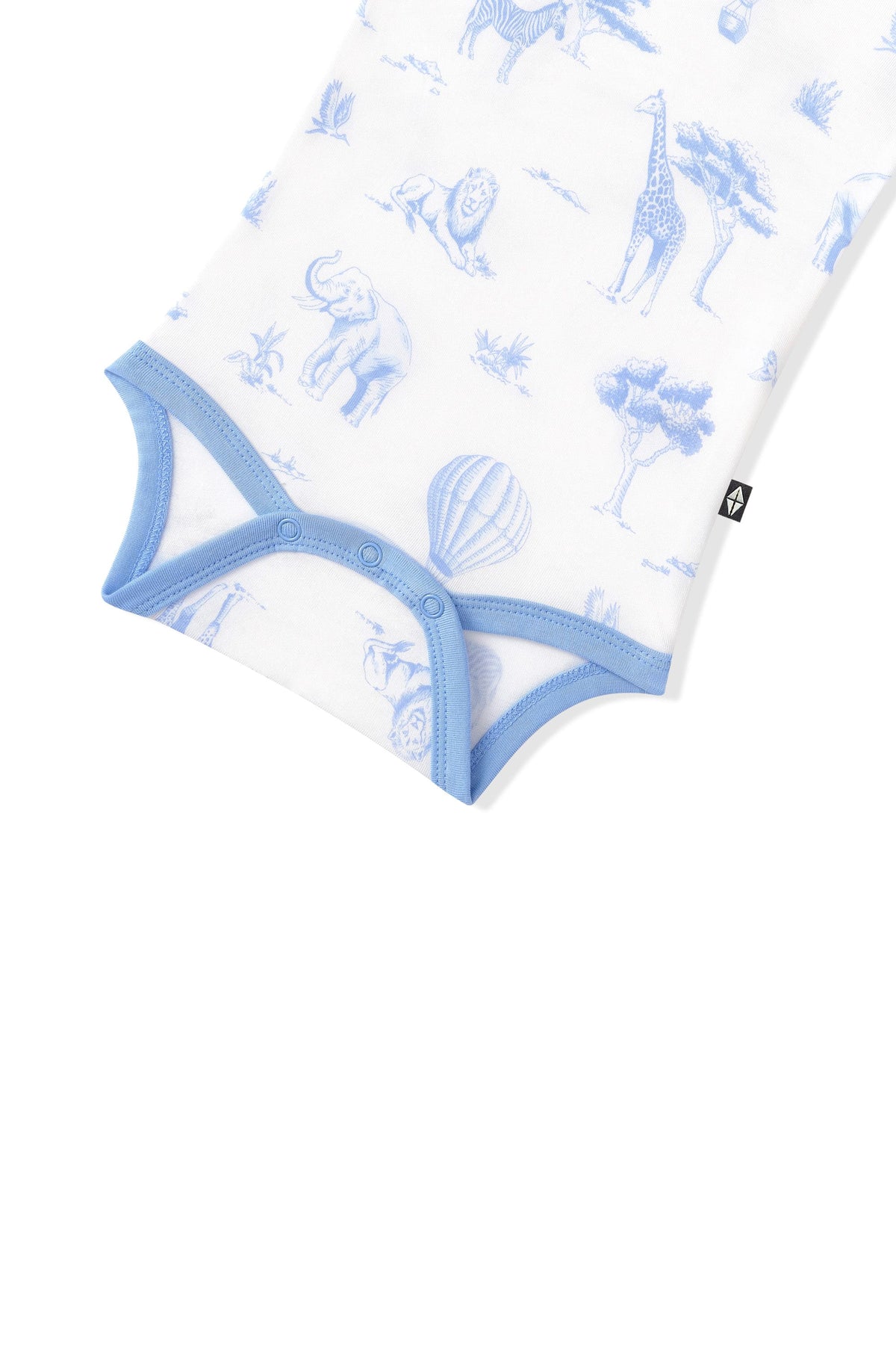 Close up of the snap closures and blue trim on the Bodysuit in Toile Safari