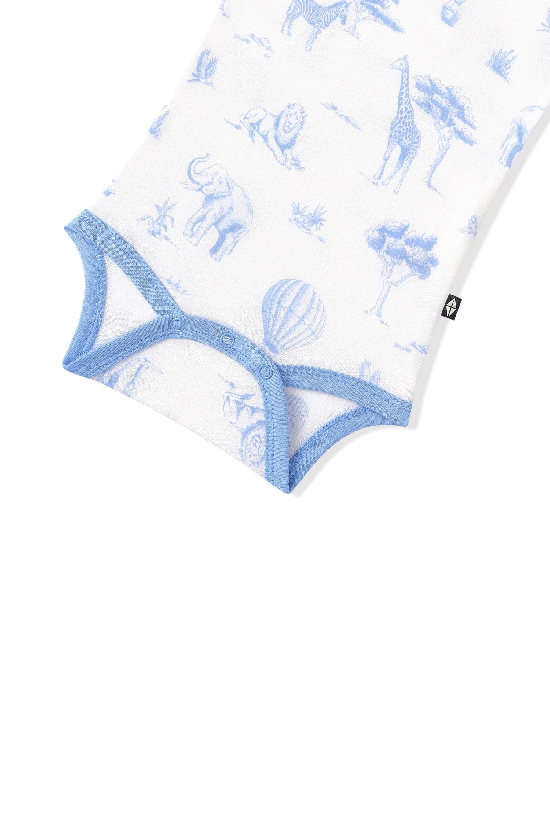 Close up of the snap closures and blue trim on the Bodysuit in Toile Safari