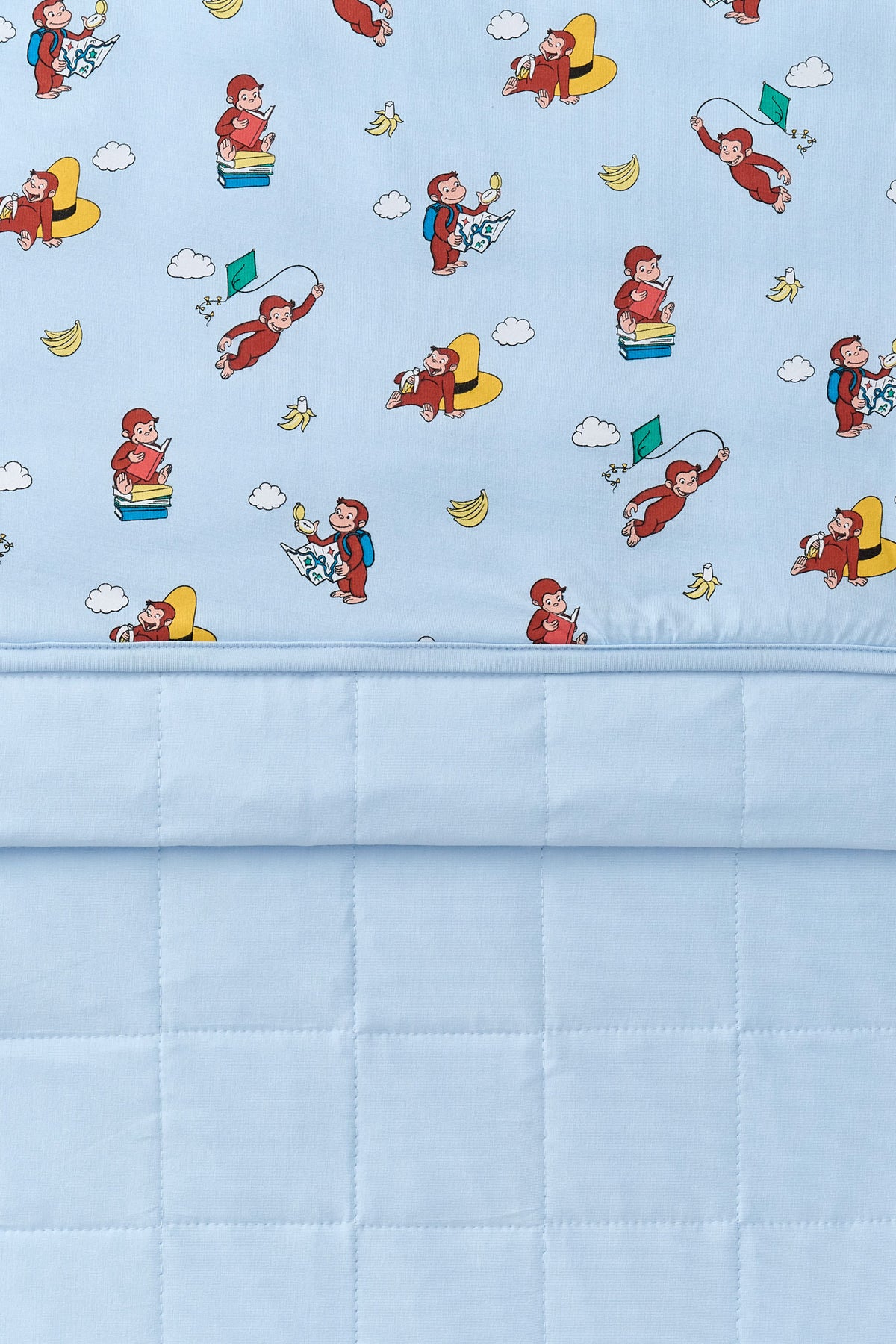 Front and back of Blue Toddler Blanket in Curious George 1.0 print