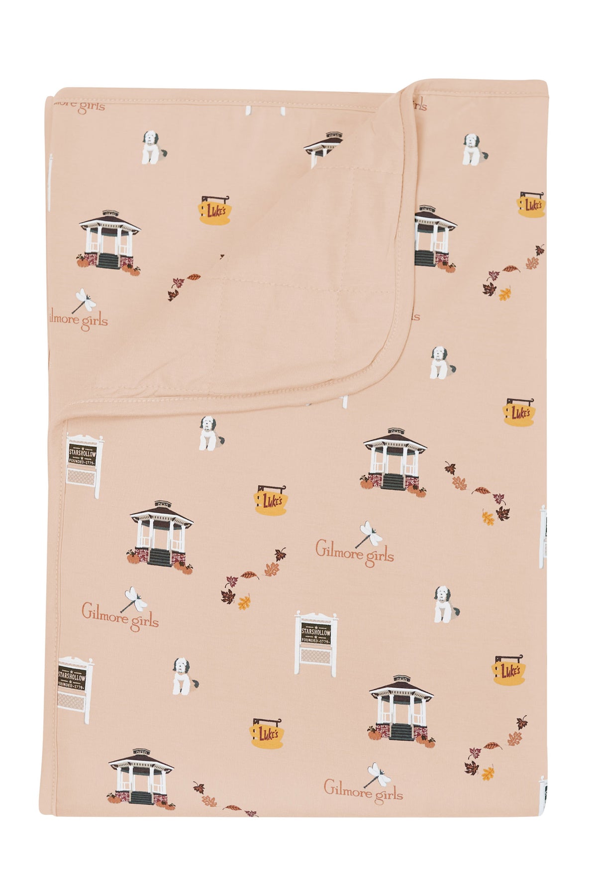Beige blanket with Gilmore Girls pattern on a white background