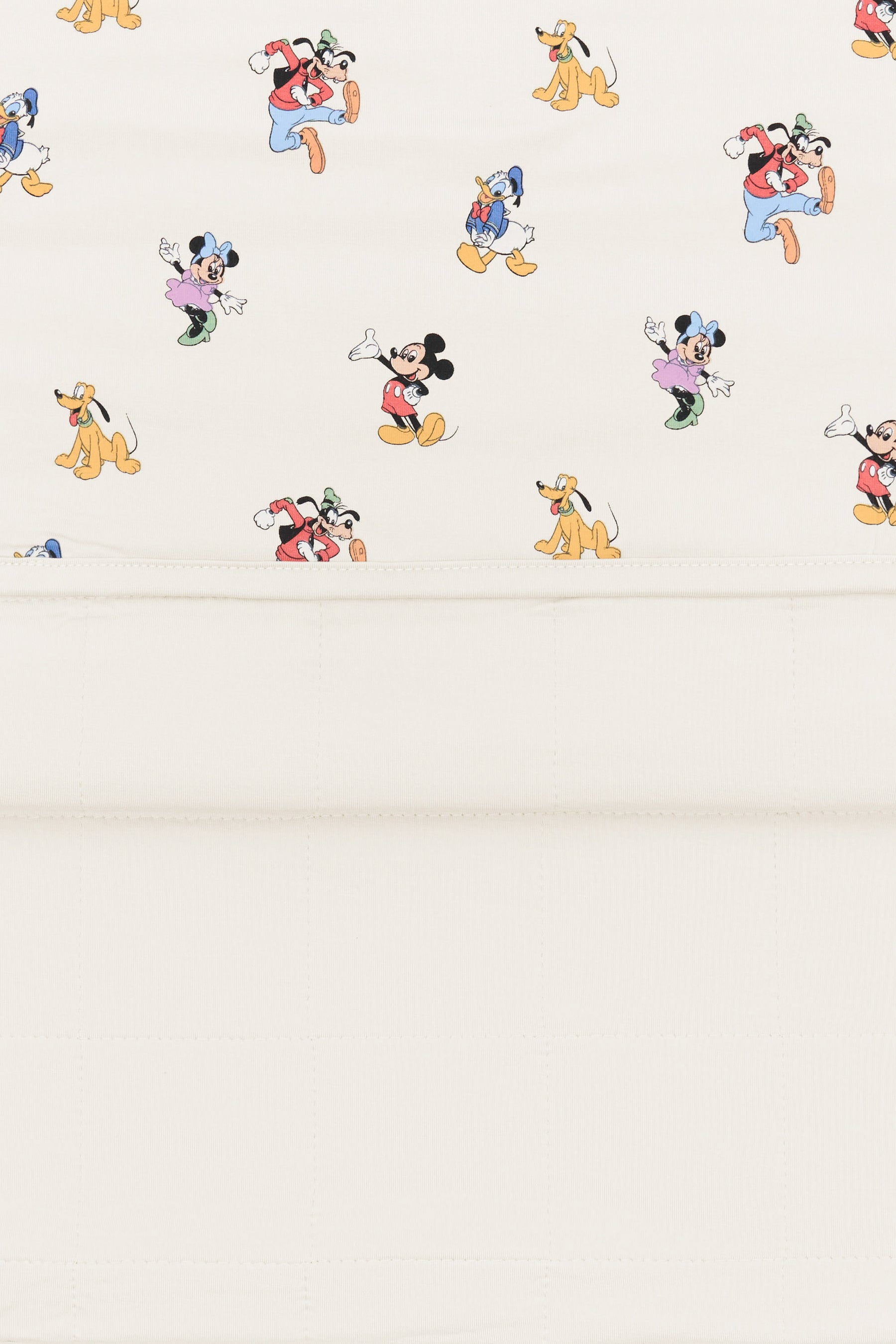 Back side fabric of Toddler Blanket in Mickey Mouse and Friends print on an oat background