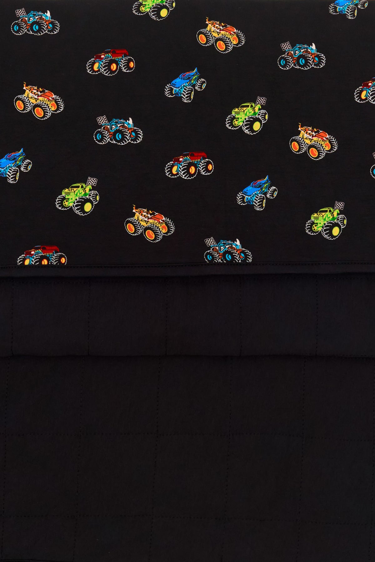Front and back of Black Toddler Blanket in Monster truck print