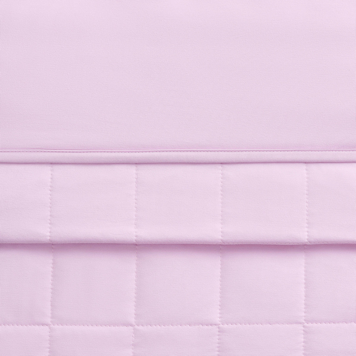 Close-up of a quilted lavender blanket 