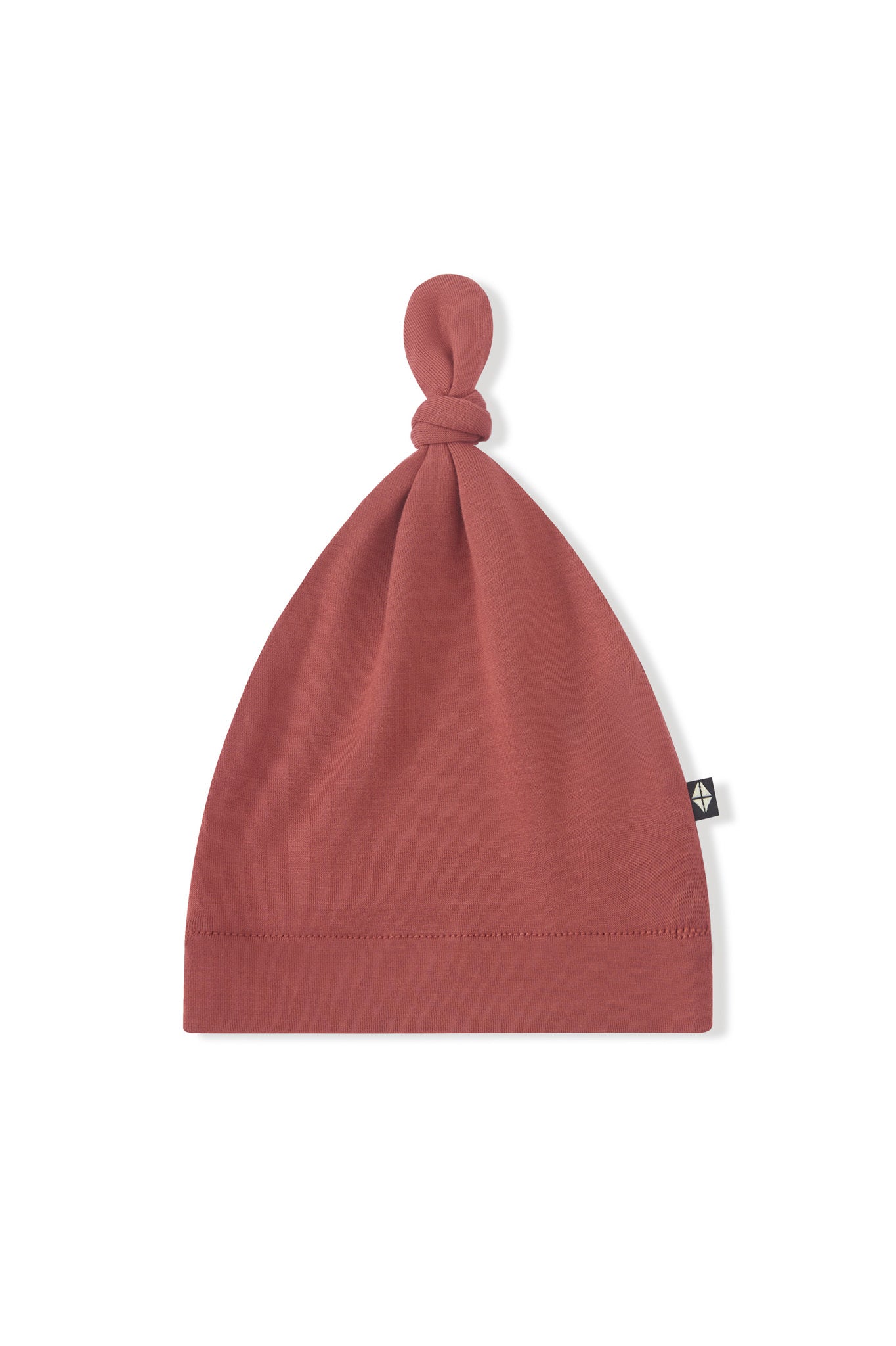 Knotted Cap in Ember on a white background