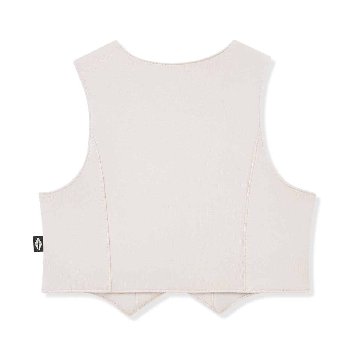 Cream vest with a small logo on the back against a white background