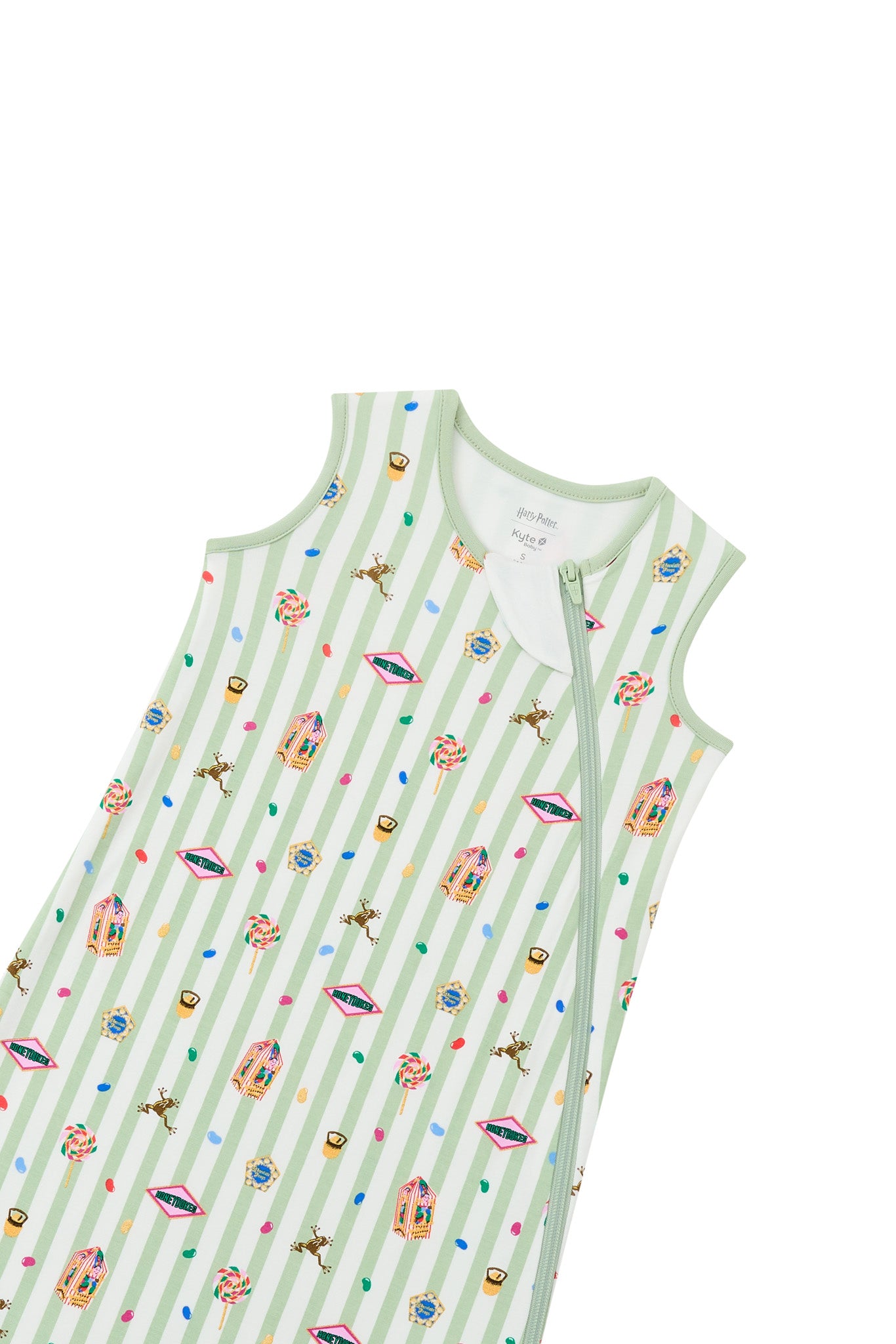 Zipper of green and white striped sleep bag with colorful Harry Potter patterns on a white background