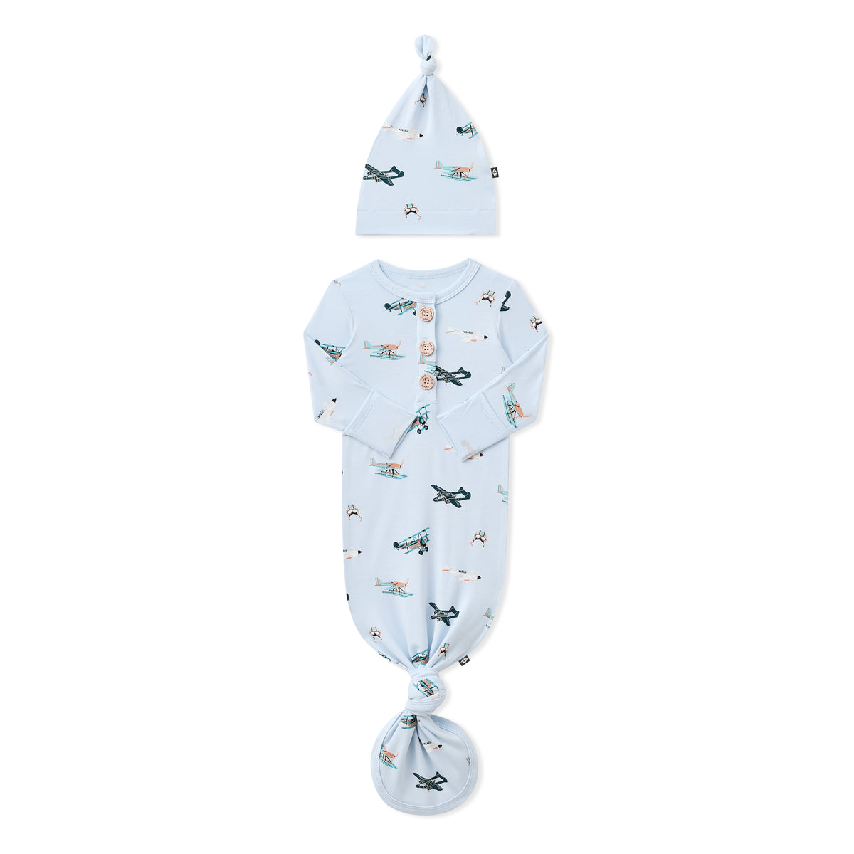 Knotted Gown with Hat Set in Take Off shown with the arms folded inwards