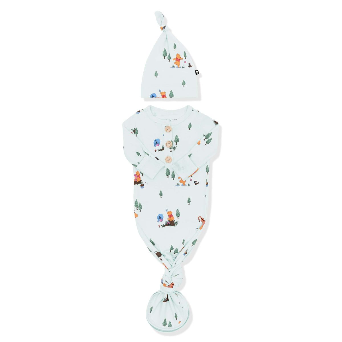 Knotted Gown with Hat Set in Winnie the Pooh Hundred Acre Wood with the arms folded inwards shown on a white surface