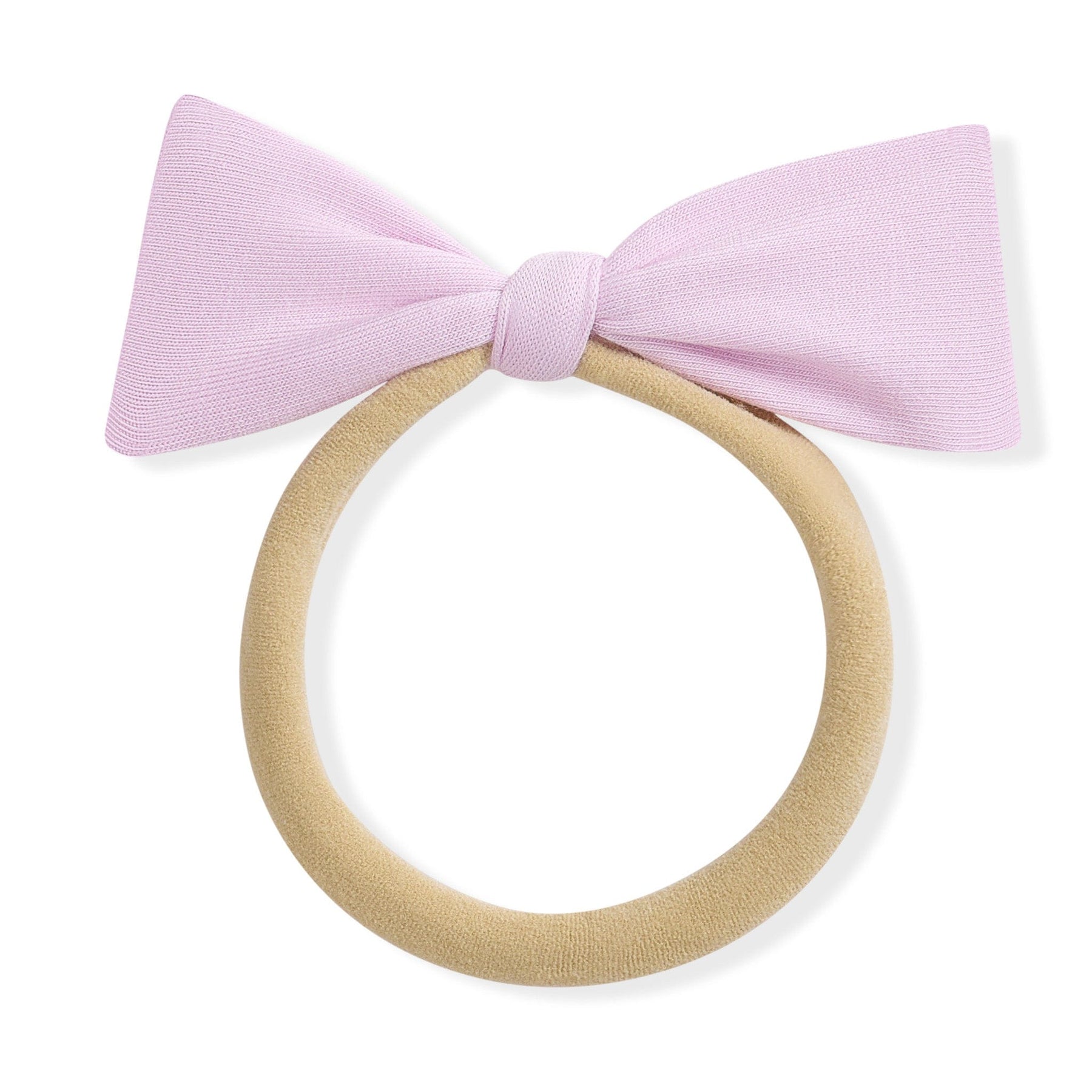 Purple bow on a beige nylon band against a white background