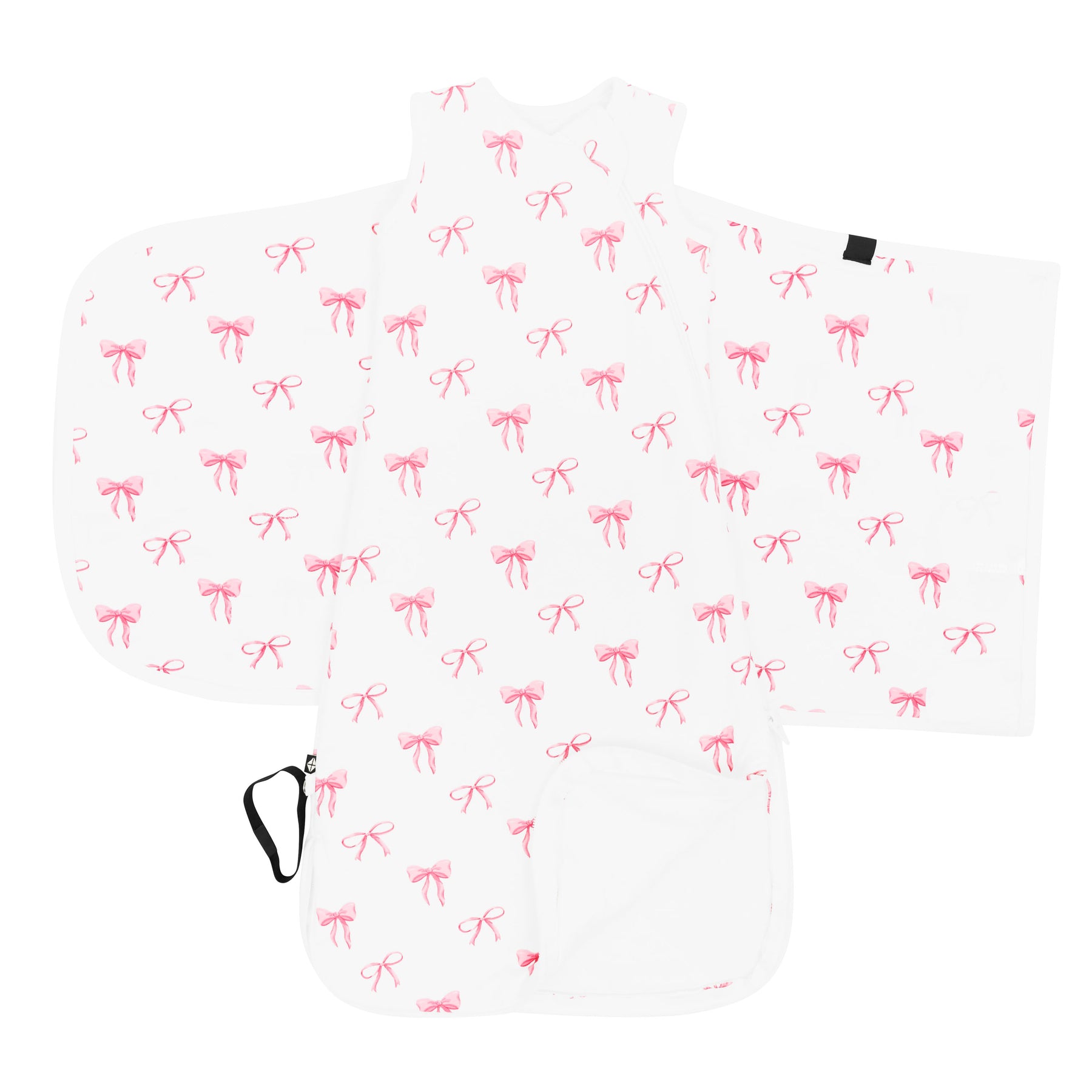 Kyte Baby's Sleep Bag Swaddler in Bow 1.0 shown unswaddled with the bottom zipper undone