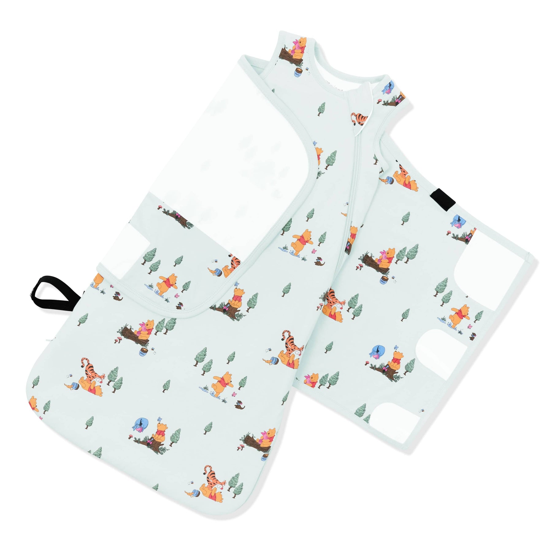 The adjustable swaddle wrap shown on an unswaddled Sleep Bag Swaddler in Winnie the Pooh Hundred Acre Wood 1.0