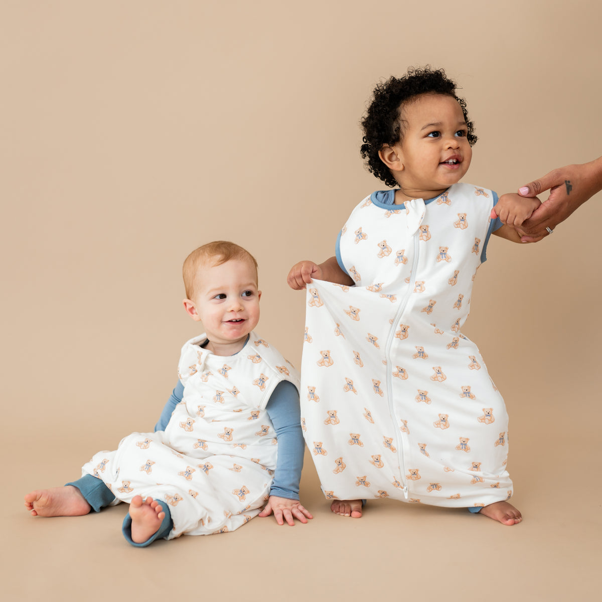 2 toddlers wearing Sleep Bag Walker in Teddy Bear 0.5 and 1.0