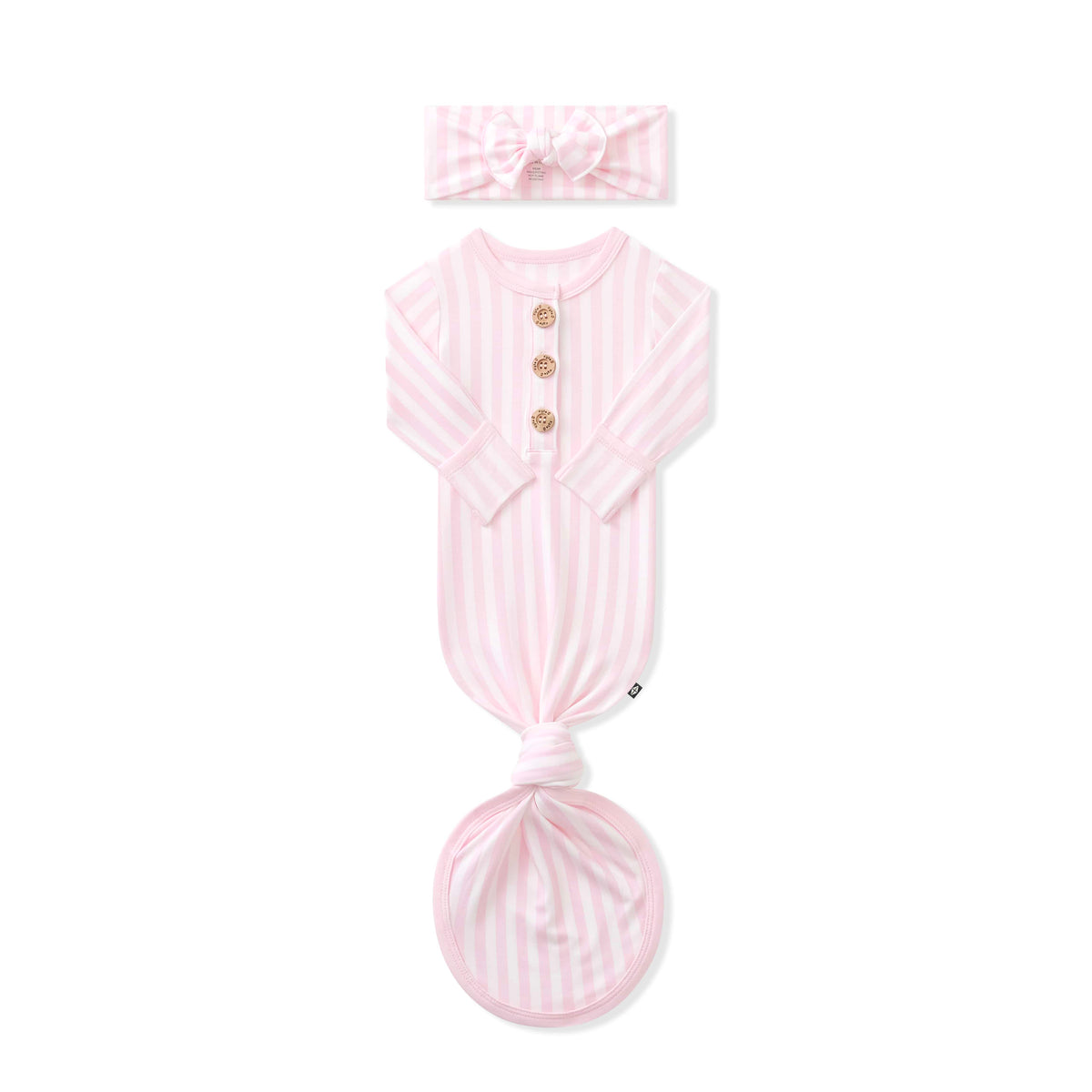Knotted Gown with Bow Set in Small Sakura Stripe shown with the arms folded in laying on a white background