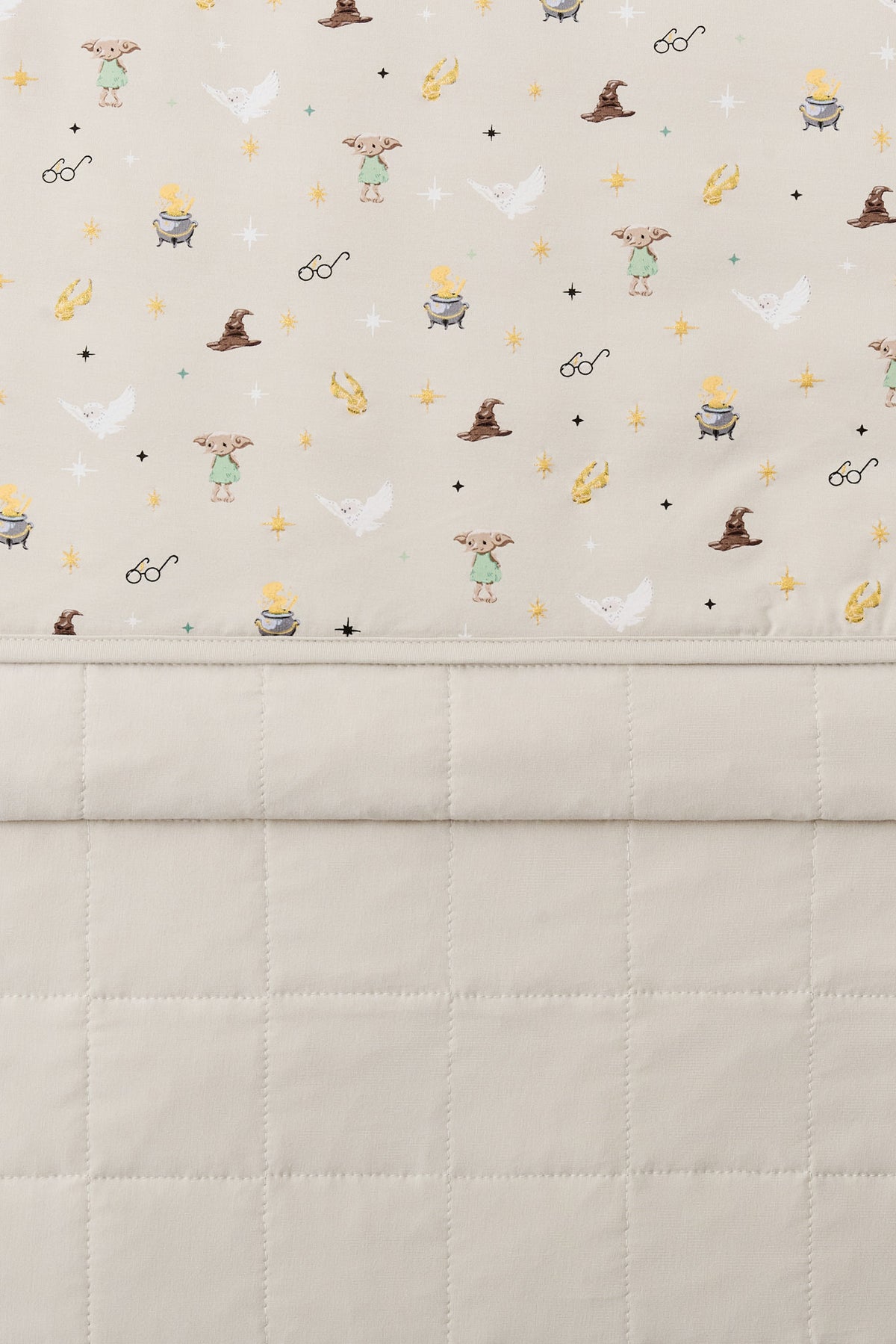 Beige Adult Blanket with Harry Potter pattern print with plain beige fabric at the back