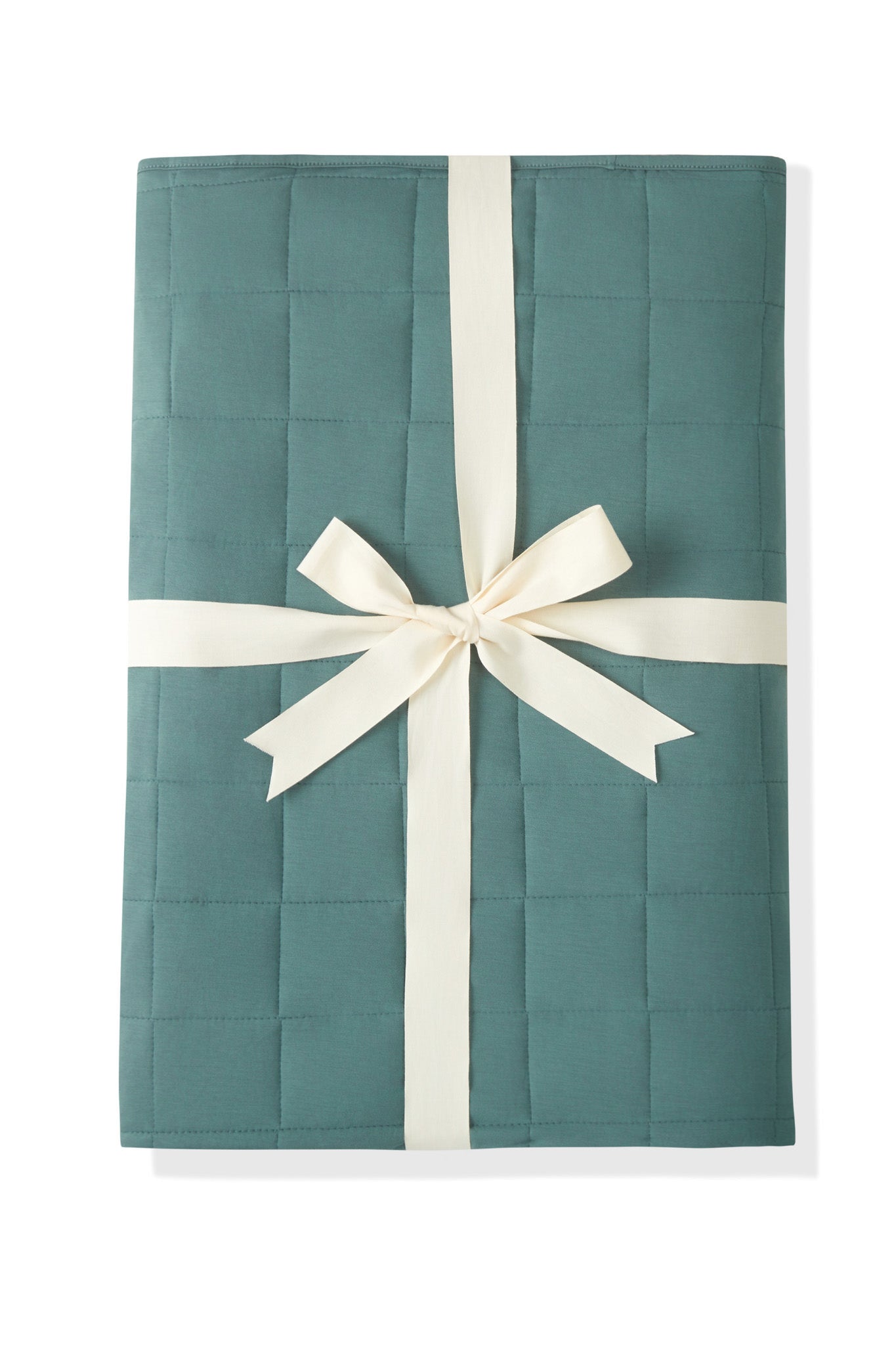 Adult Quilted Blanket in Pine 2.5 packed with a ribbon on a white background