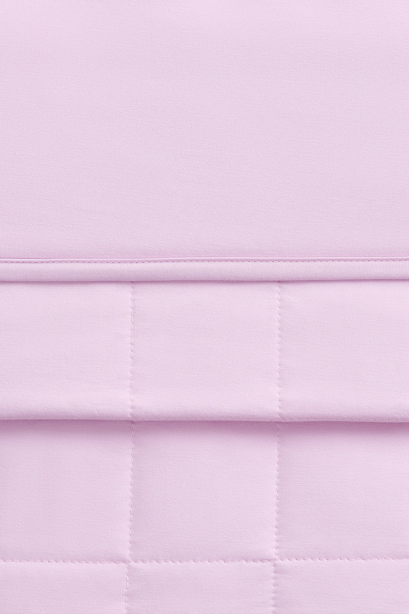 Close-up of a light purple bamboo quilt 