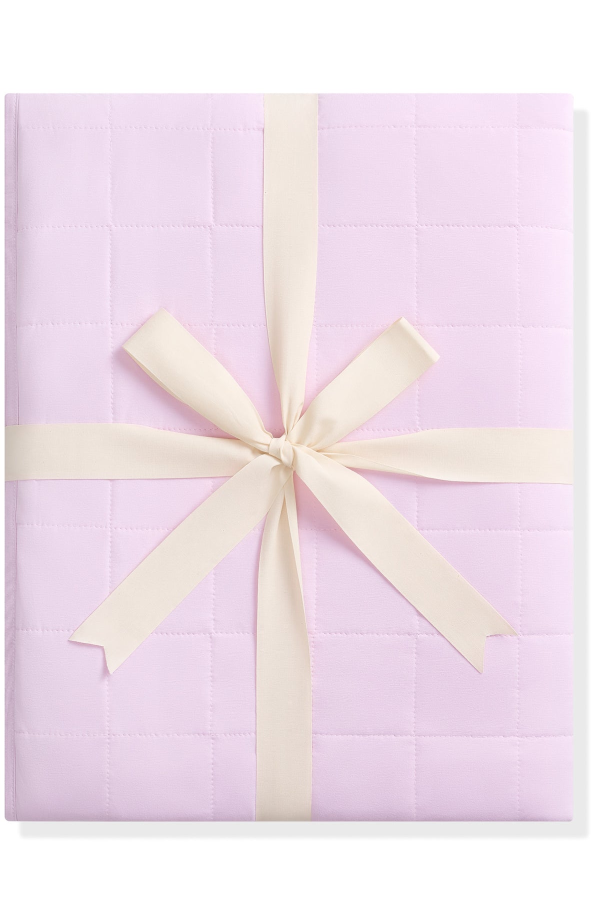 Purple quilted blanket with a cream ribbon on a white background