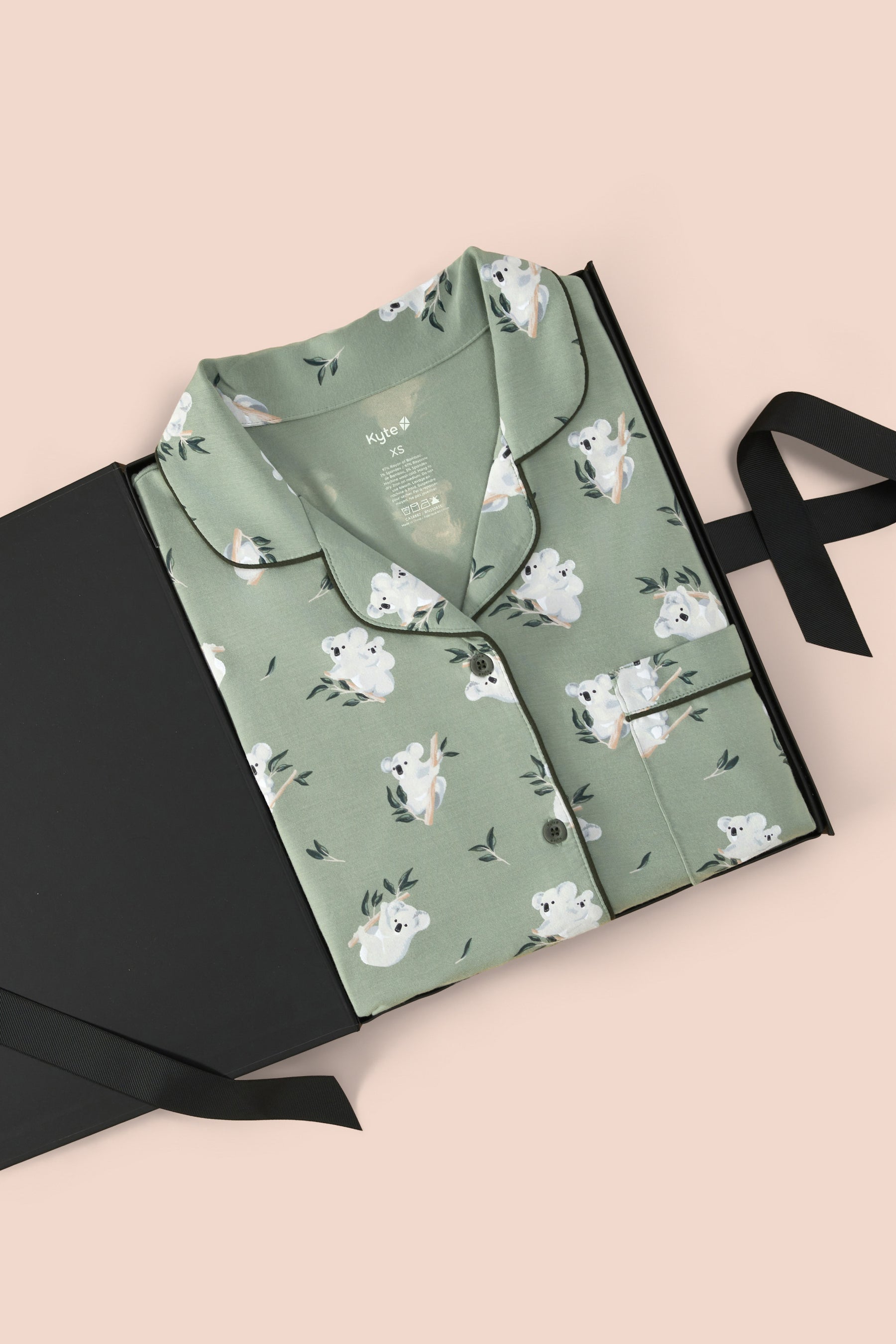 Women's Short Sleeve Pajama Set in Koala packed in a box on a beige background