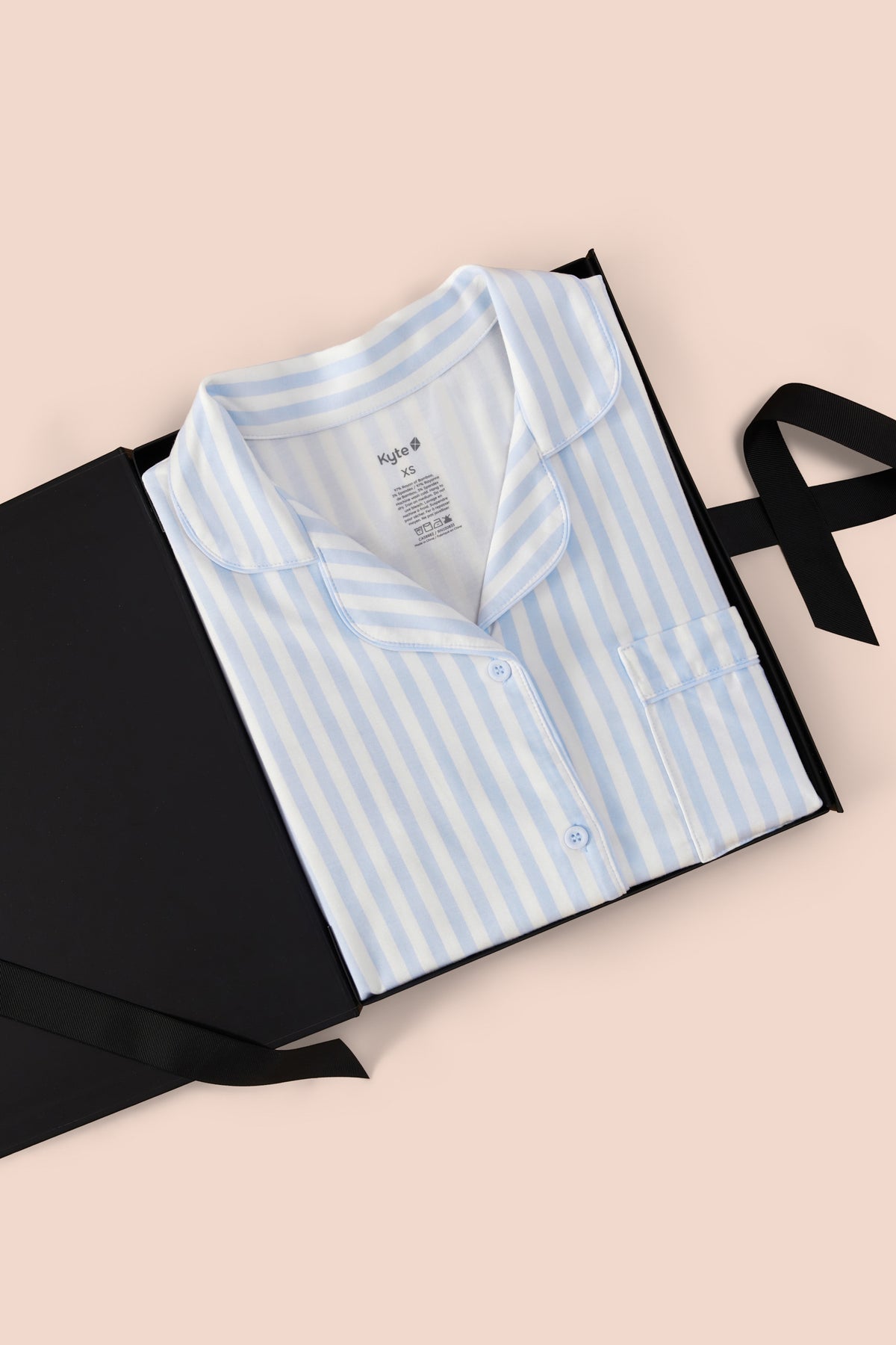 Women's Short Sleeve Pajama Set in Small Mist Stripe print packed in a box on a beige background