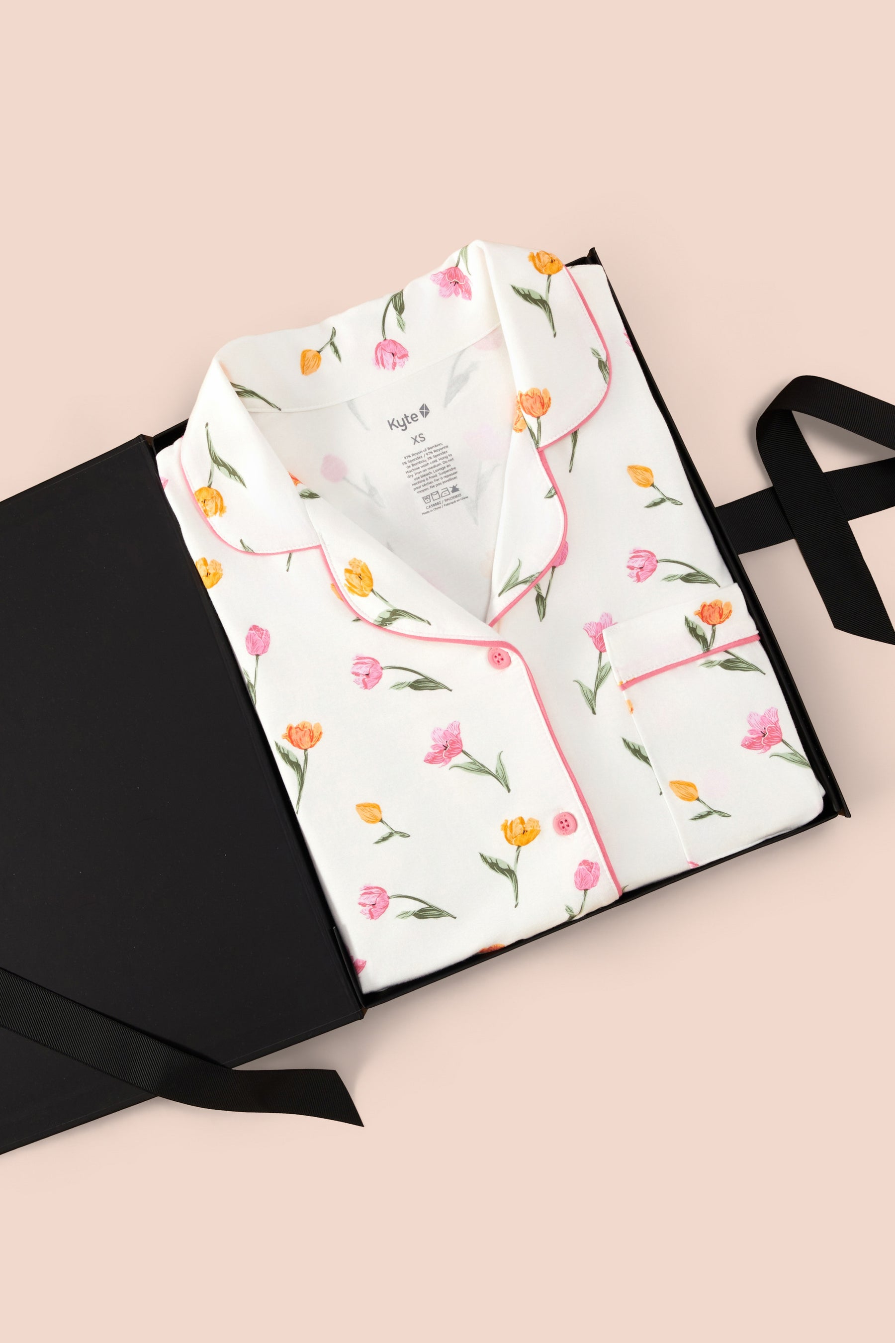 Women's Short Sleeve Pajama Set in Tulip print packed in a box on a beige background