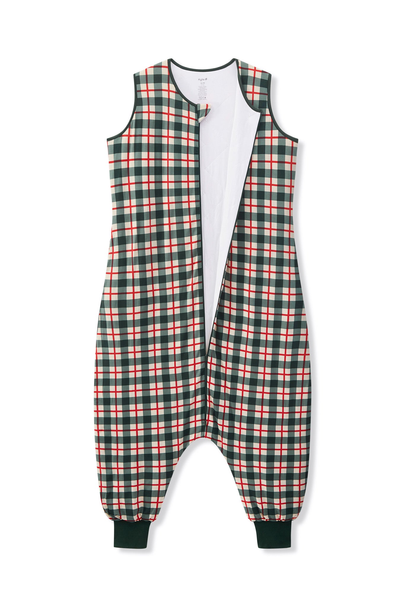 A sleeveless one-piece jumpsuit with a green, red, and white plaid pattern, featuring a white inner lining and elasticated ankle cuffs, shown flat on a white background.