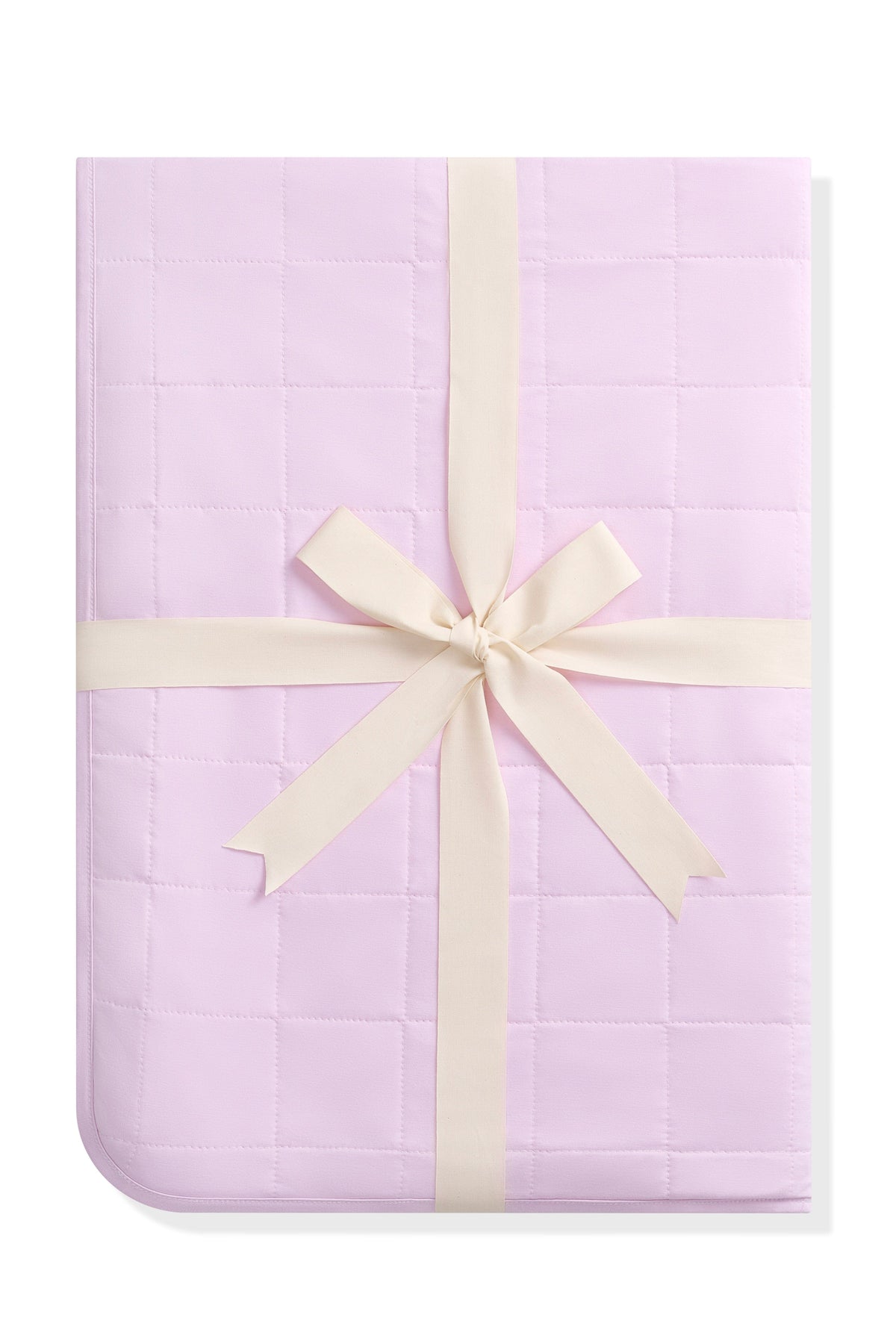 Youth Blanket in Thistle 1.0 shown in its packaging tied in a linen bow