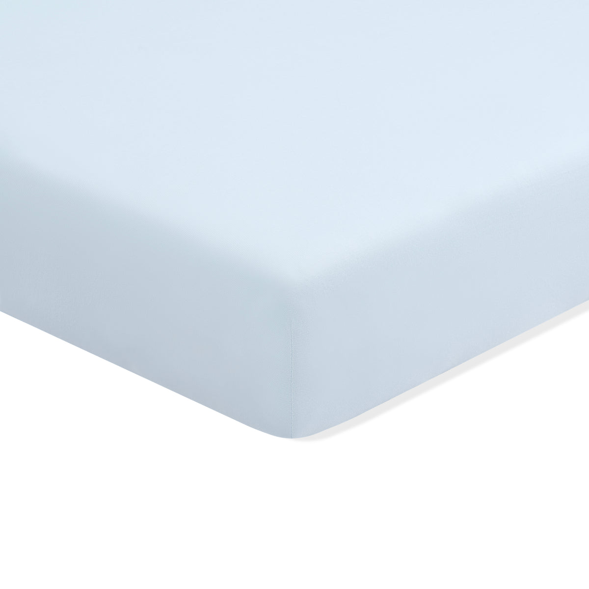 Mini Crib Sheet in Breeze shown on a mattress