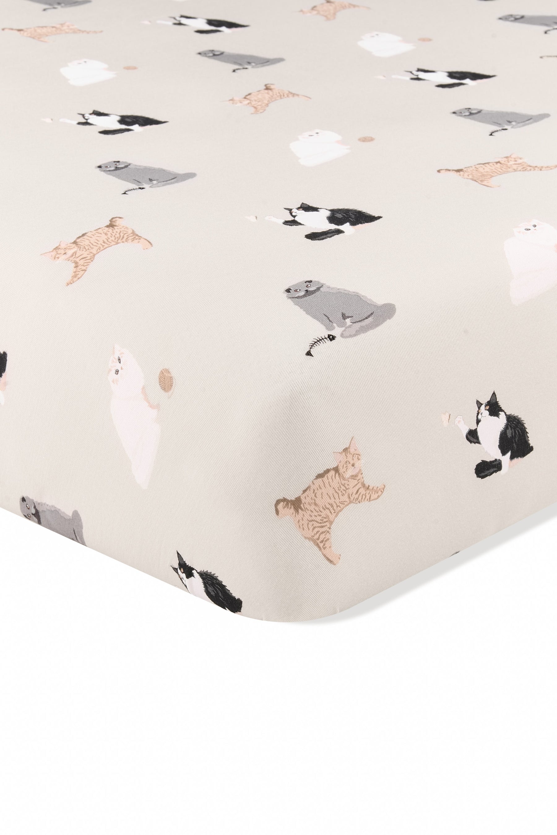 Corner of the Crib Sheet in Fluffy Cat on a mattress