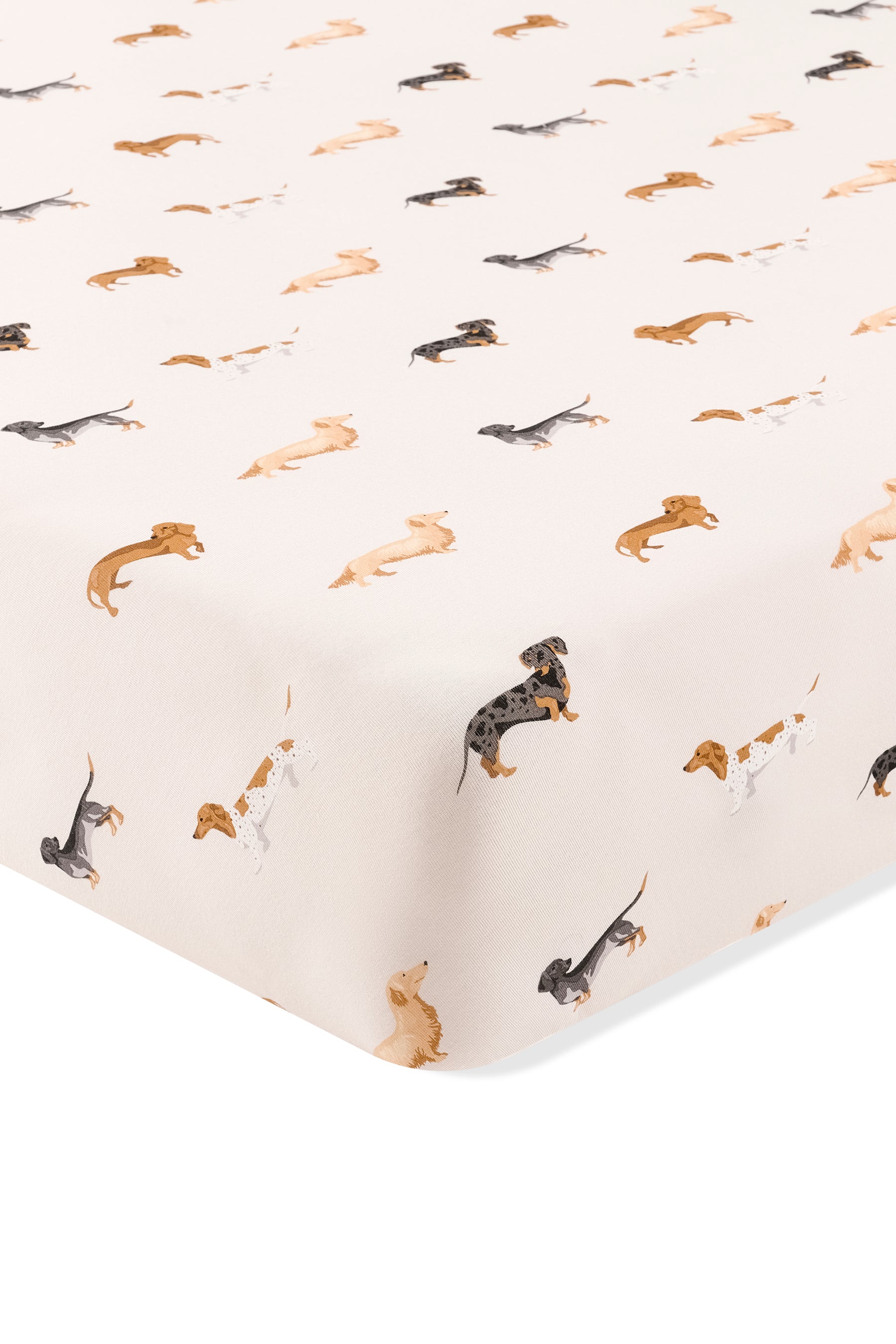 Beige Crib sheet with Dachshund print on a white background